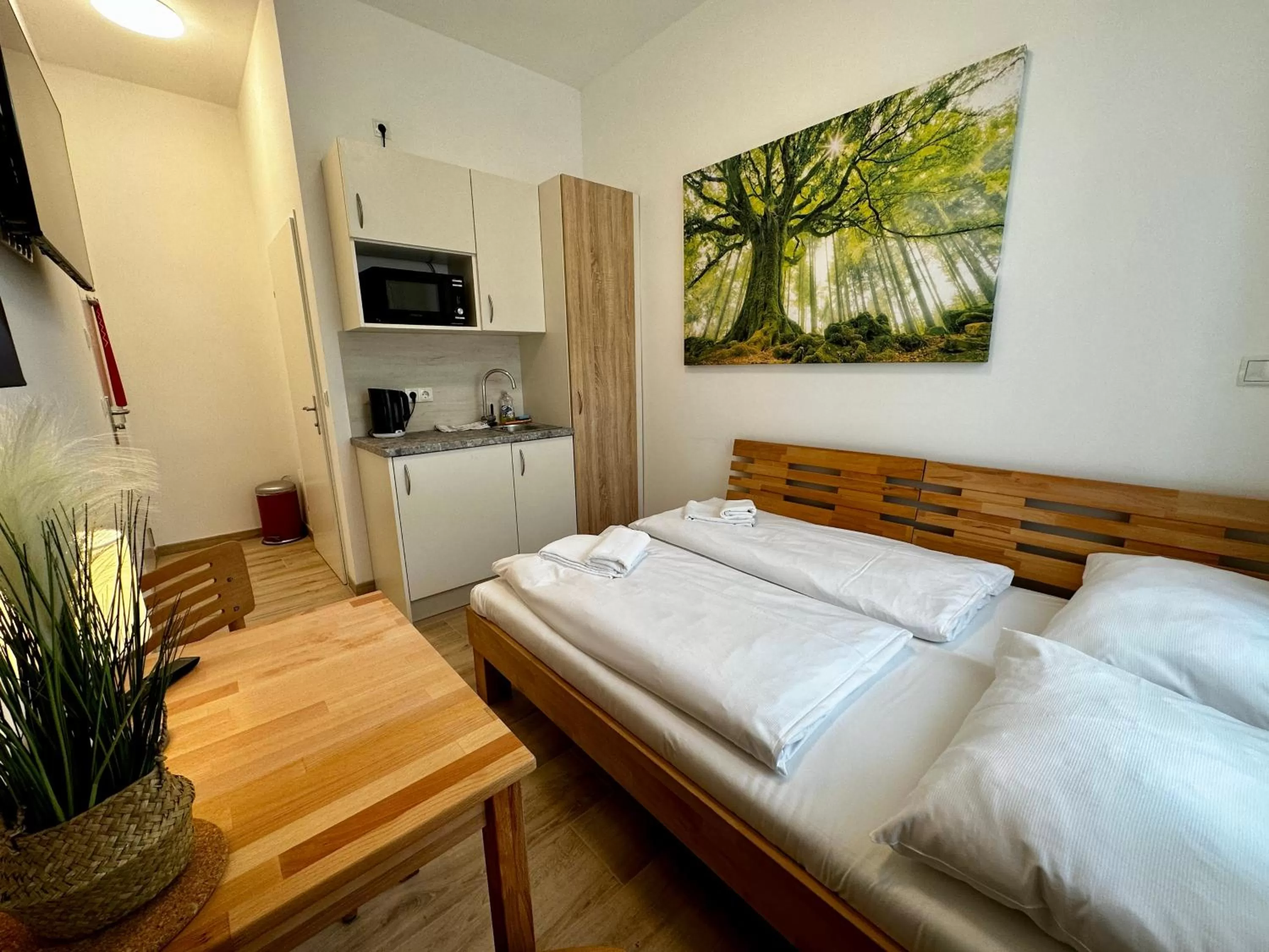 Photo of the whole room, Bed in AJO Apartments - Messe City Flat - Self-Check-in