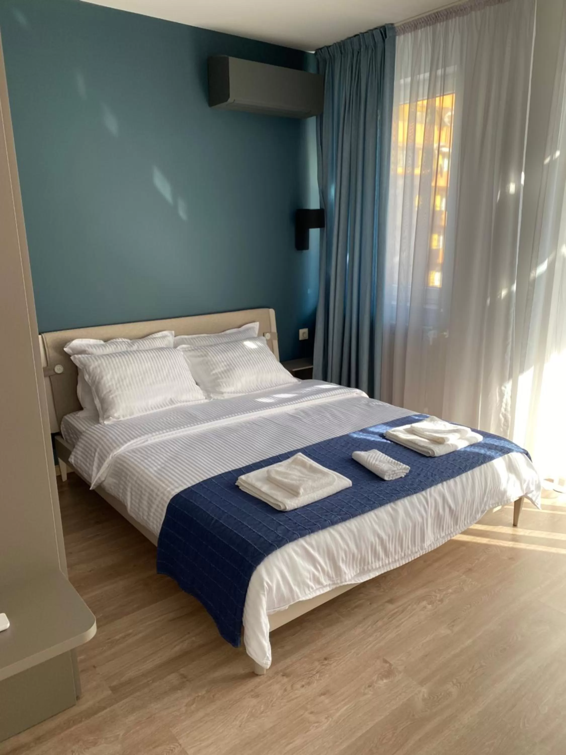 Bed in 7th Sense boutique apartments