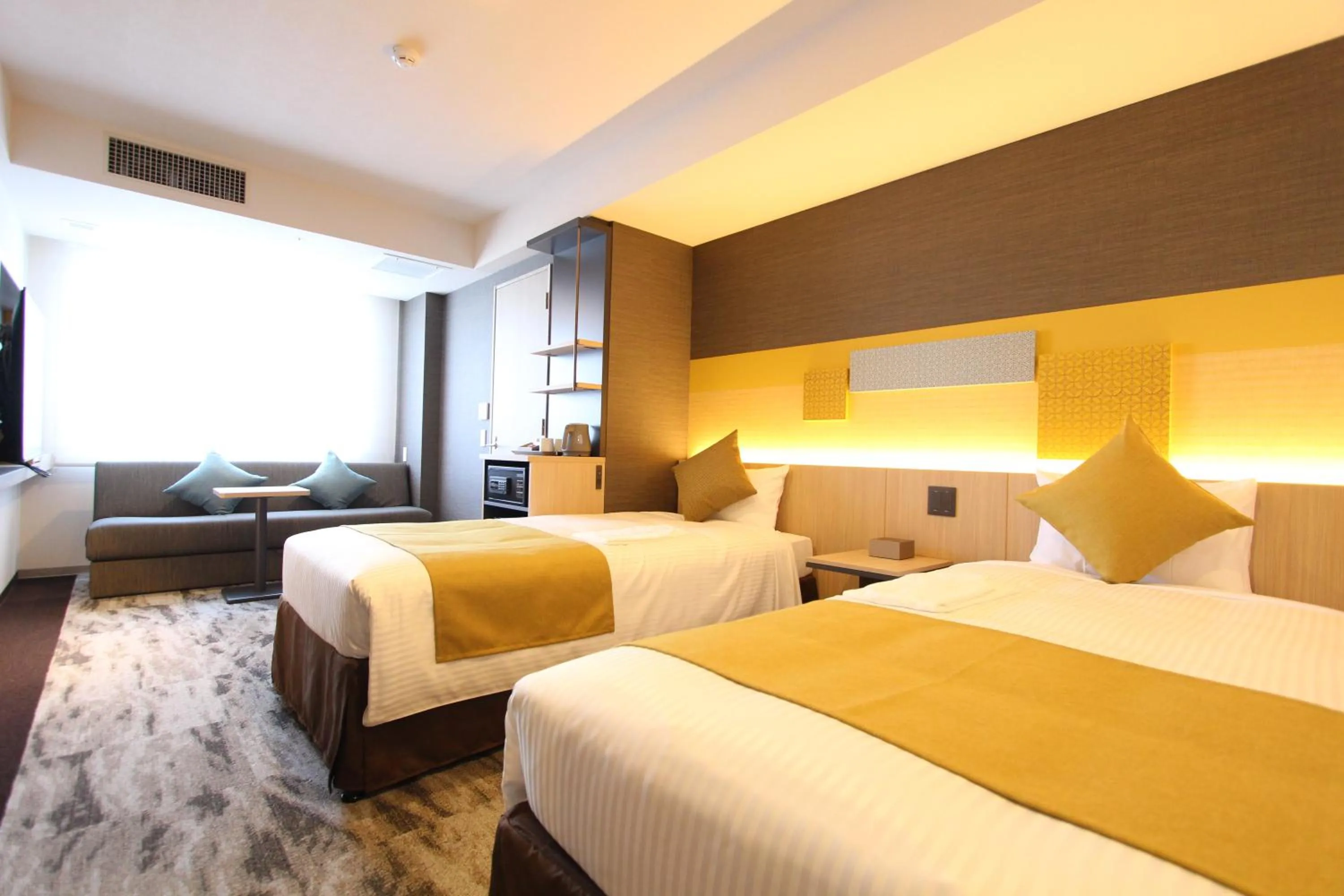 Bed in KOKO HOTEL Tsukiji Ginza