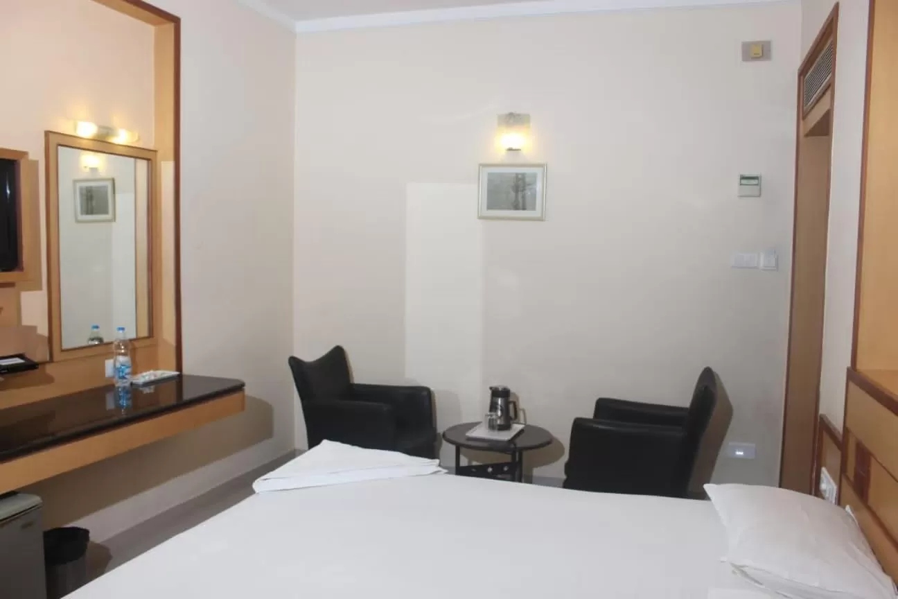 Bed in Hotel Aishwarywaa