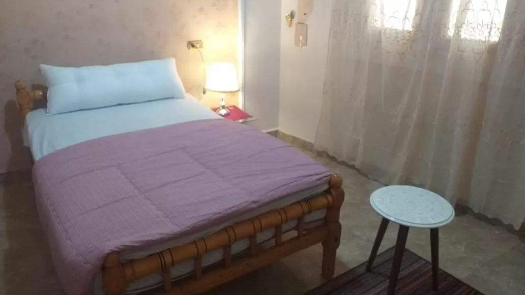 Bed in pyramid Giza city inn