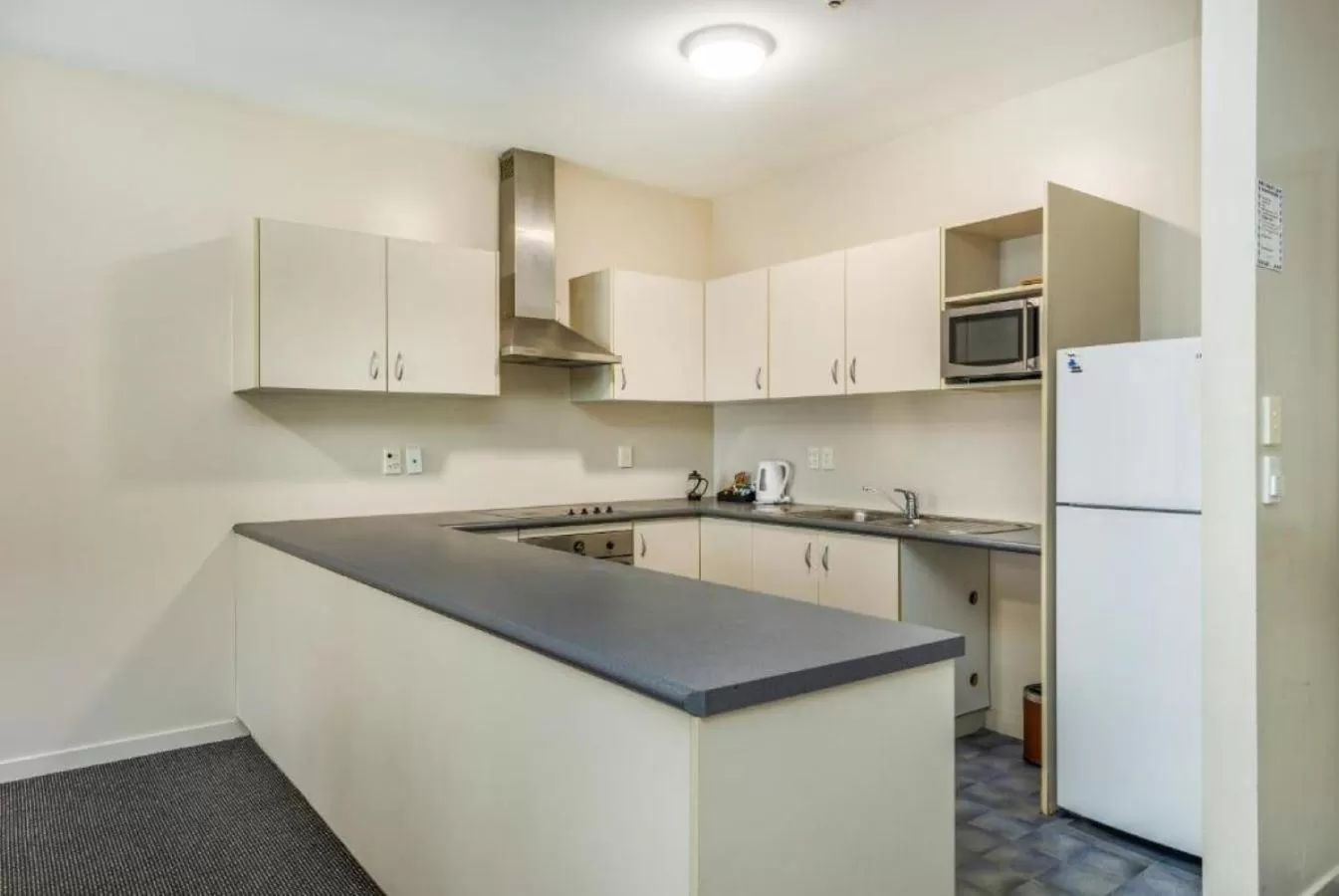 kitchen in Ramada by Wyndham, Hamilton City Center