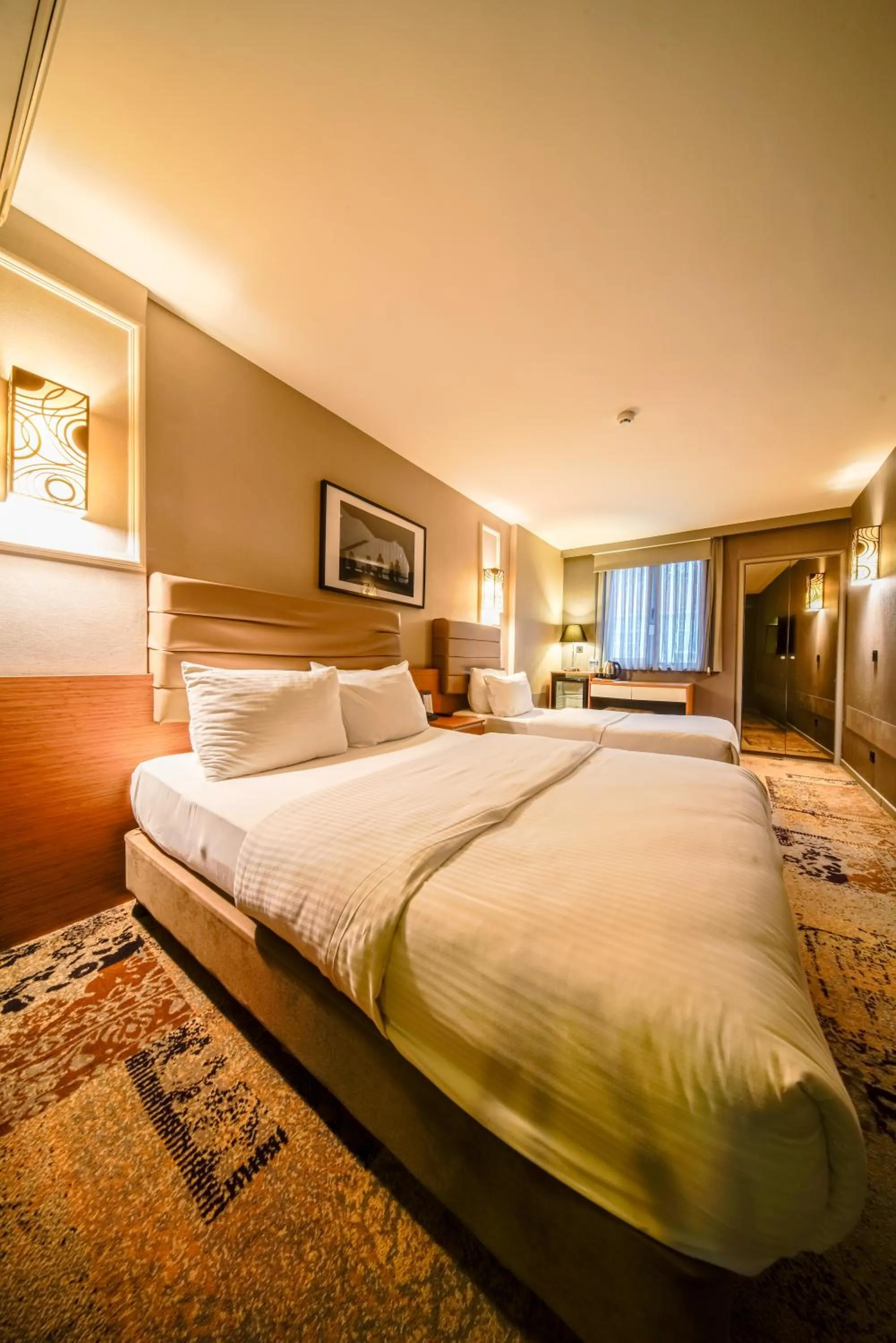 Bed in All Seasons Hotel