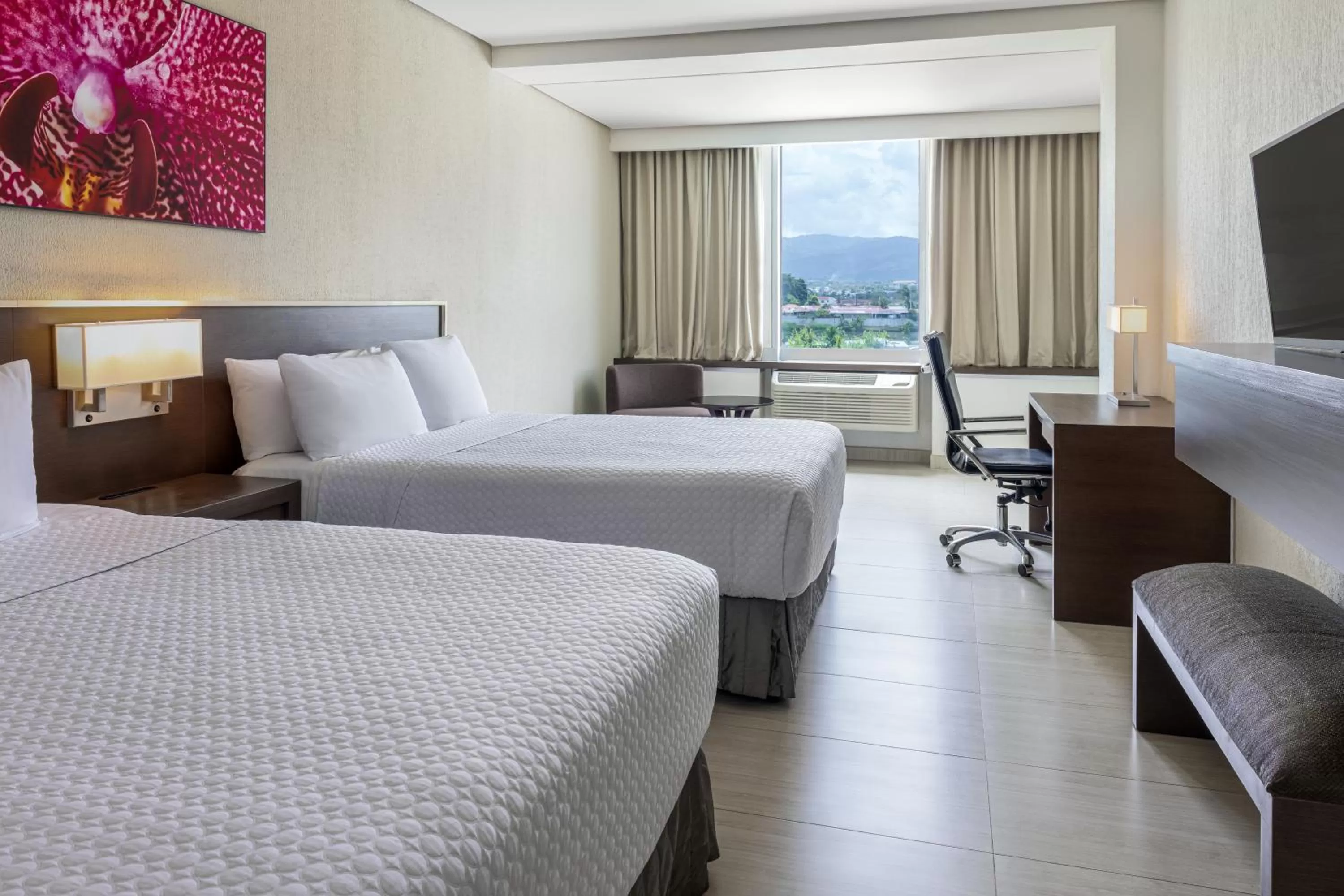 Standard Queen Room with Two Queen Beds in Crowne Plaza Airport by IHG