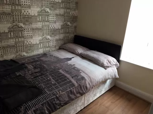 Bed in The Winter Garden Suites