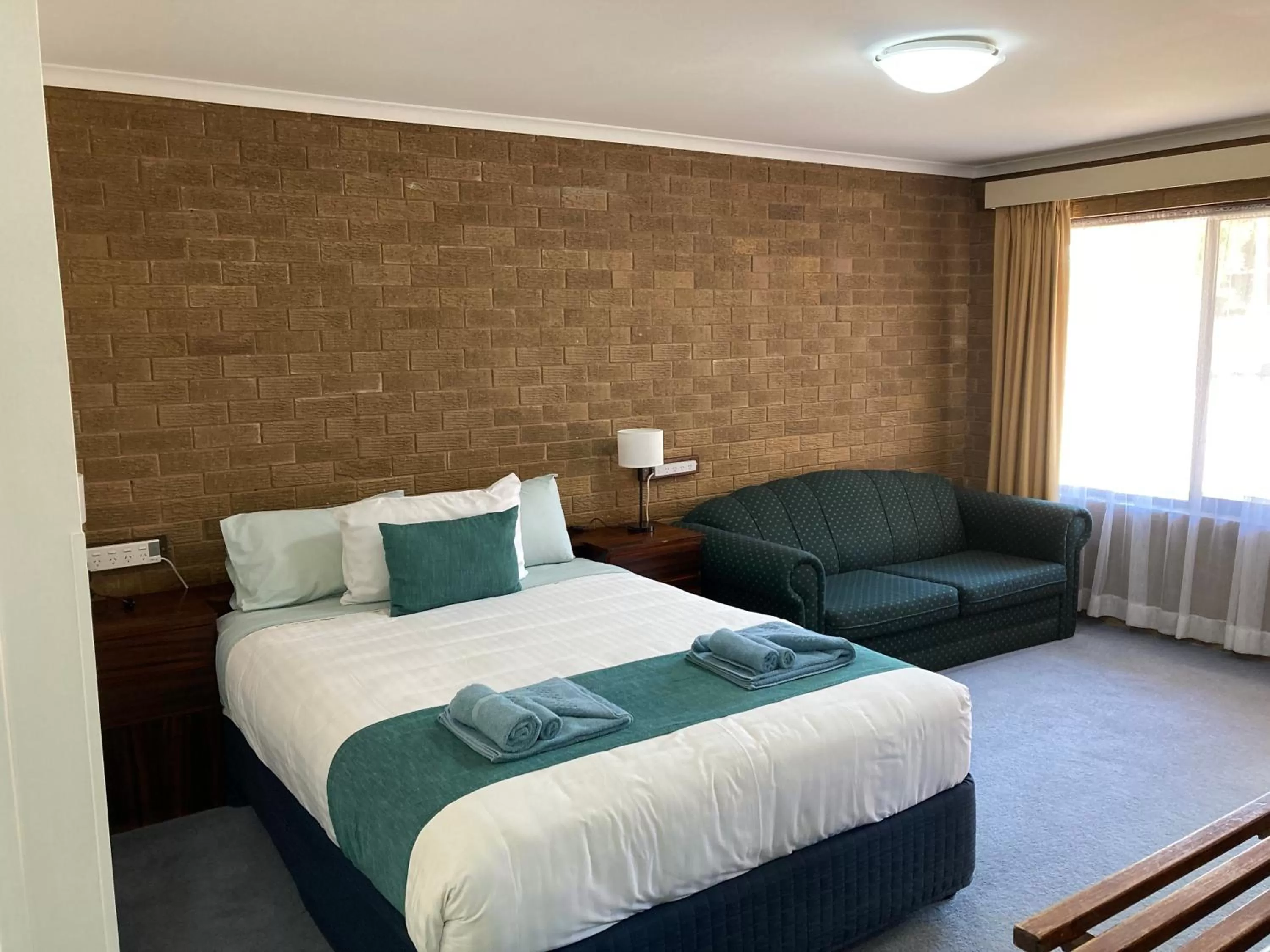 Bed in Camellia Motel