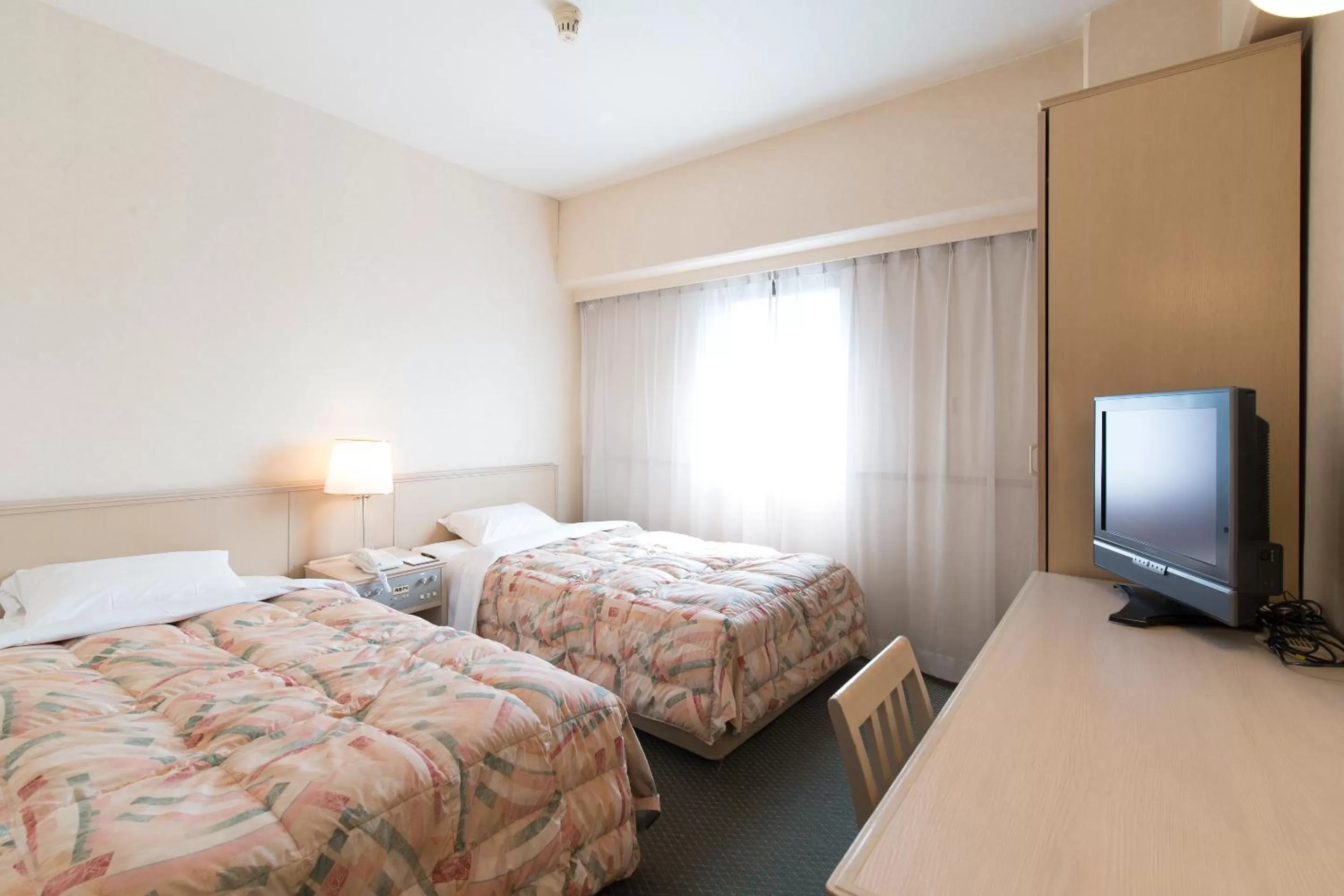 Photo of the whole room, Bed in Tabist Hotel Tetora Kitakyushu