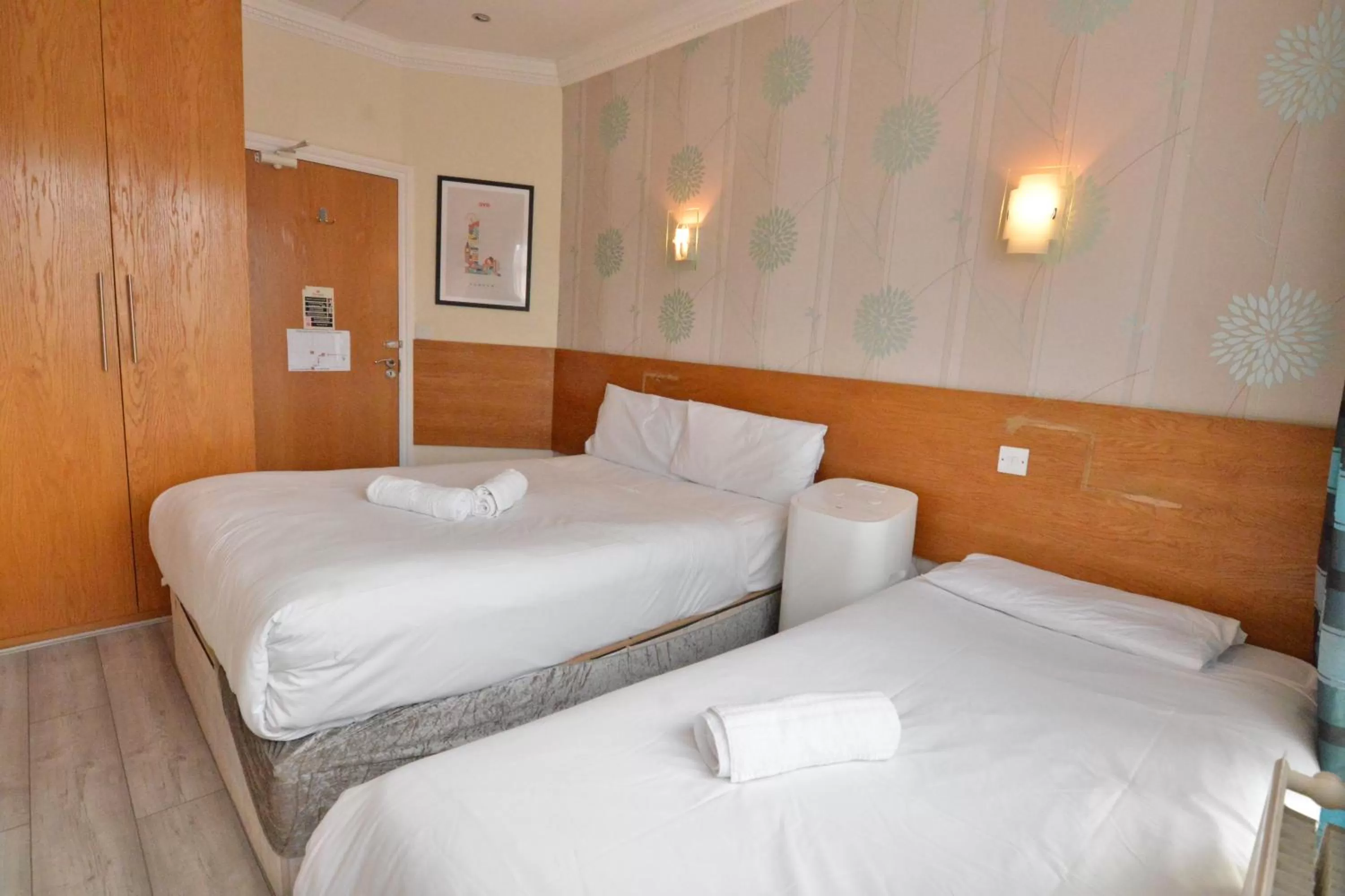 Bed in Anchor Guest House