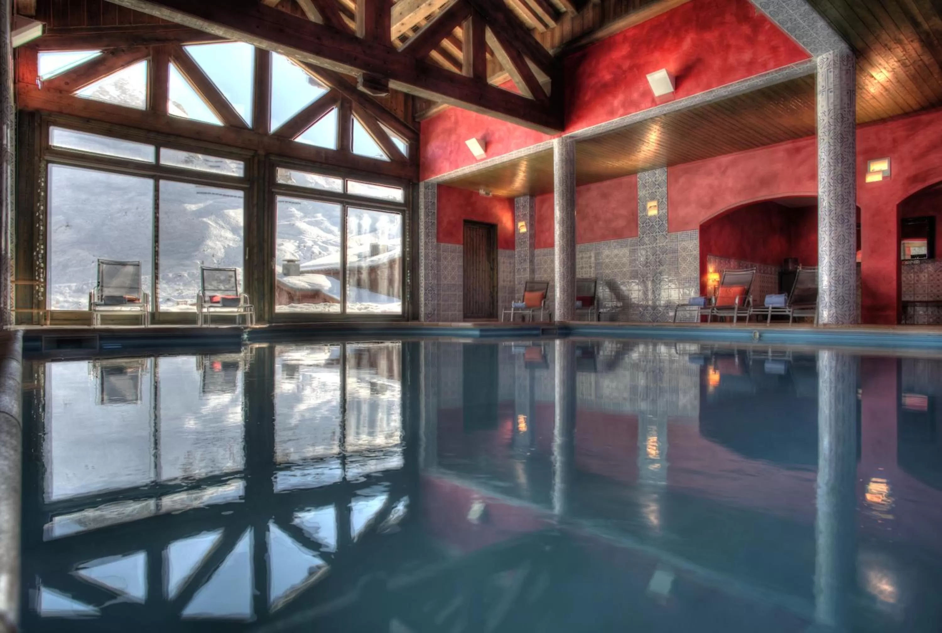 Swimming pool in Hôtel Les Suites du Montana by Les Etincelles