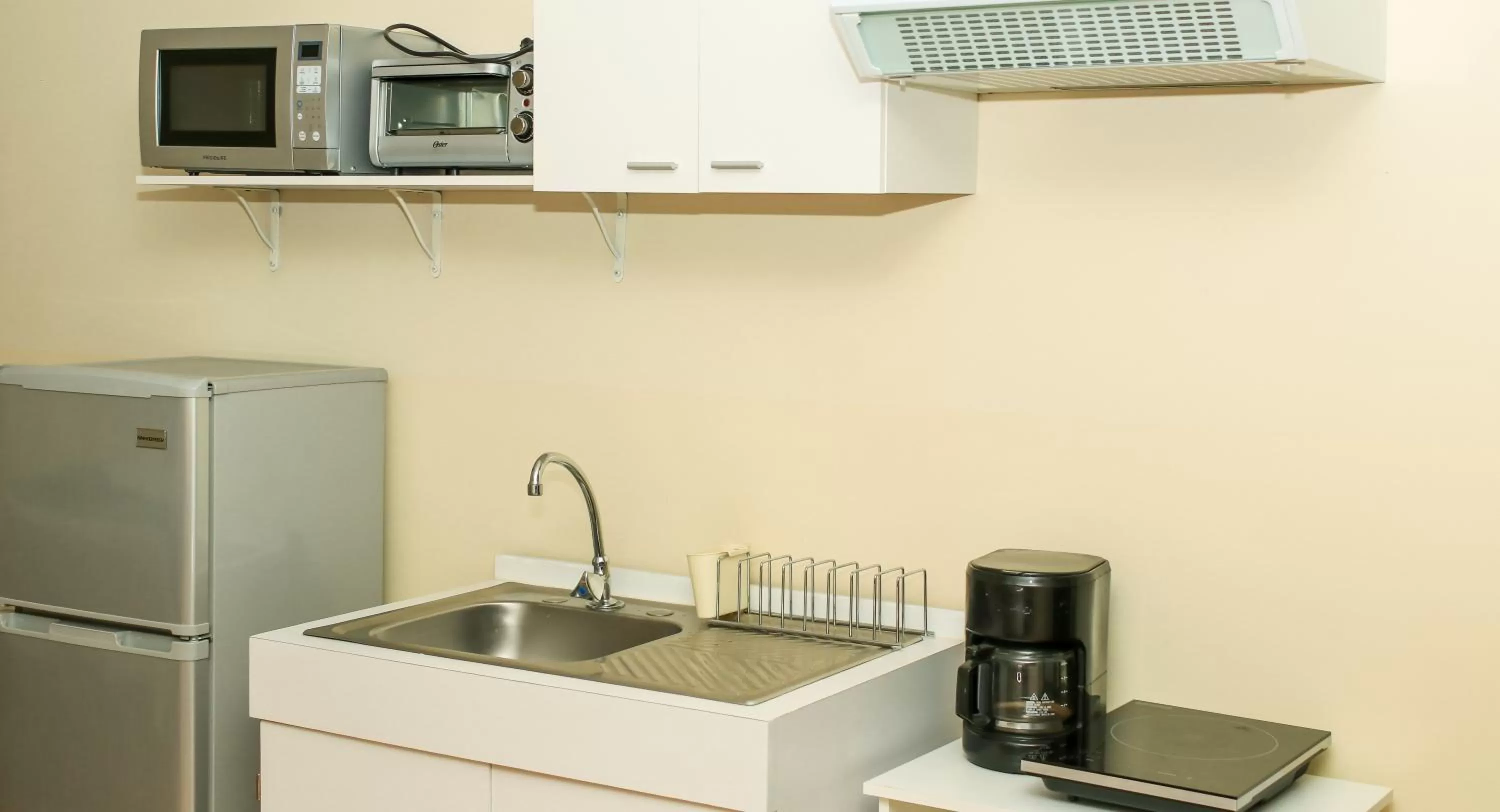 Kitchen or kitchenette in Las Magnolias Hotel Boutique