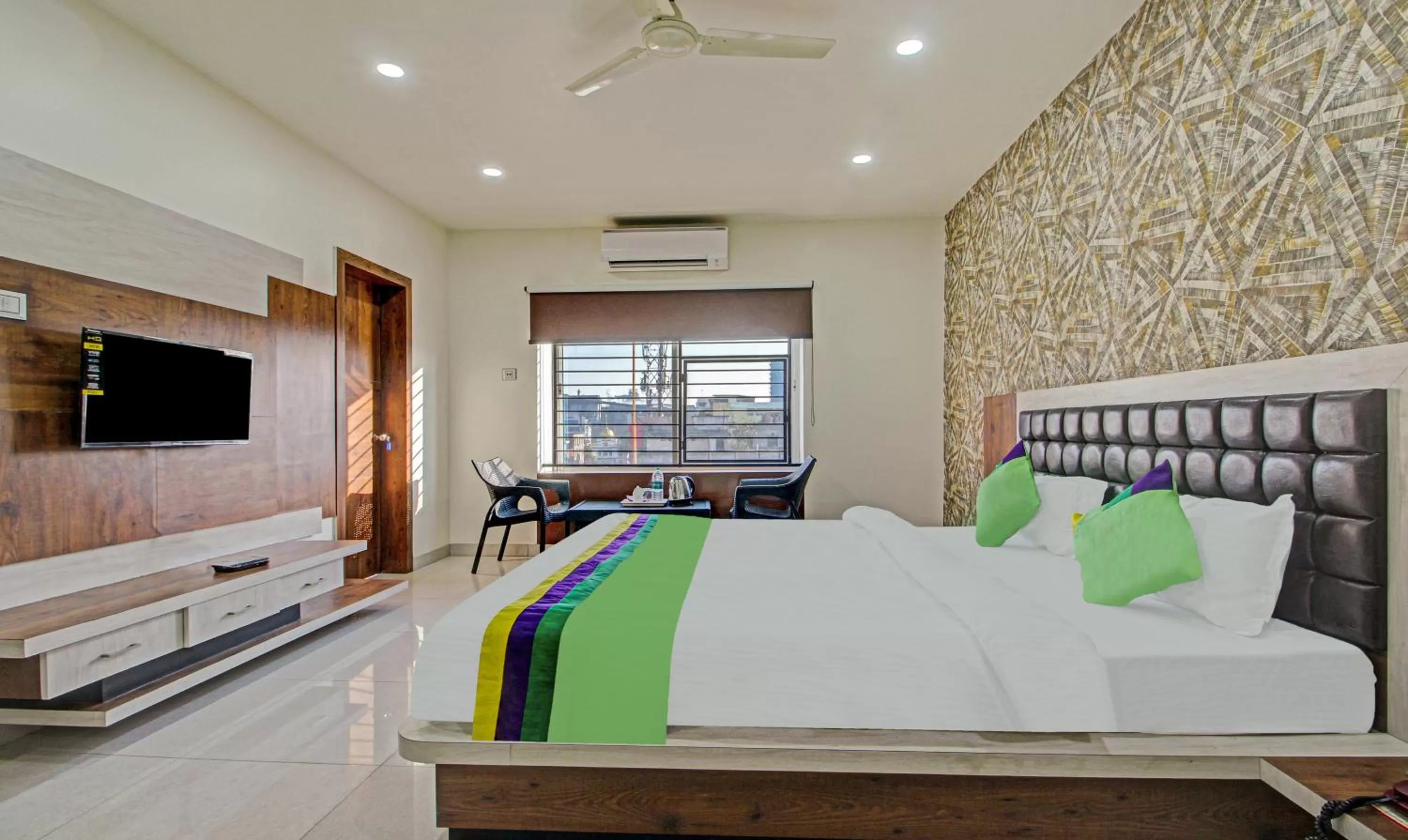 Bedroom, Bed in Treebo Golden Heights