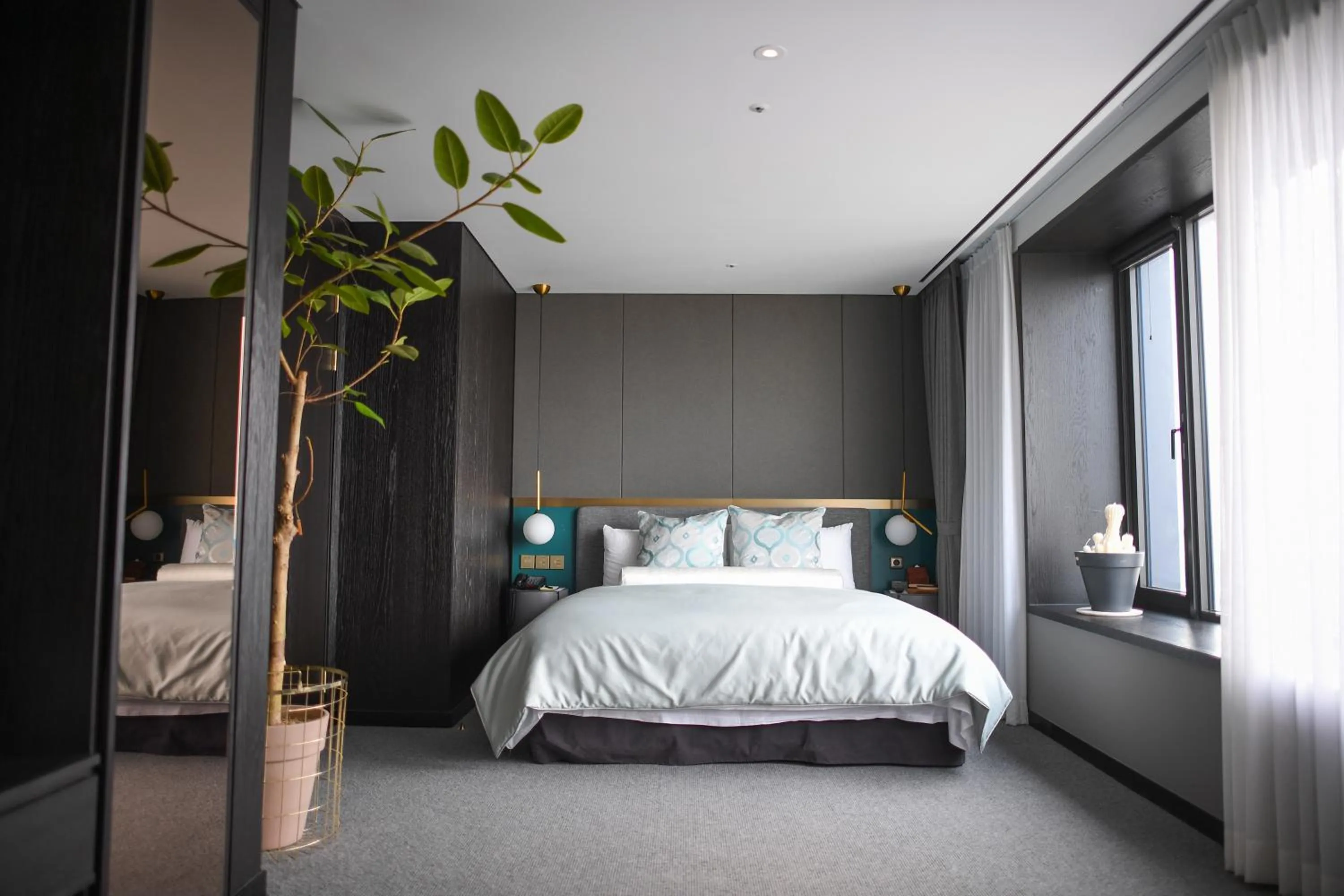 Bed in Maison Glad Jeju