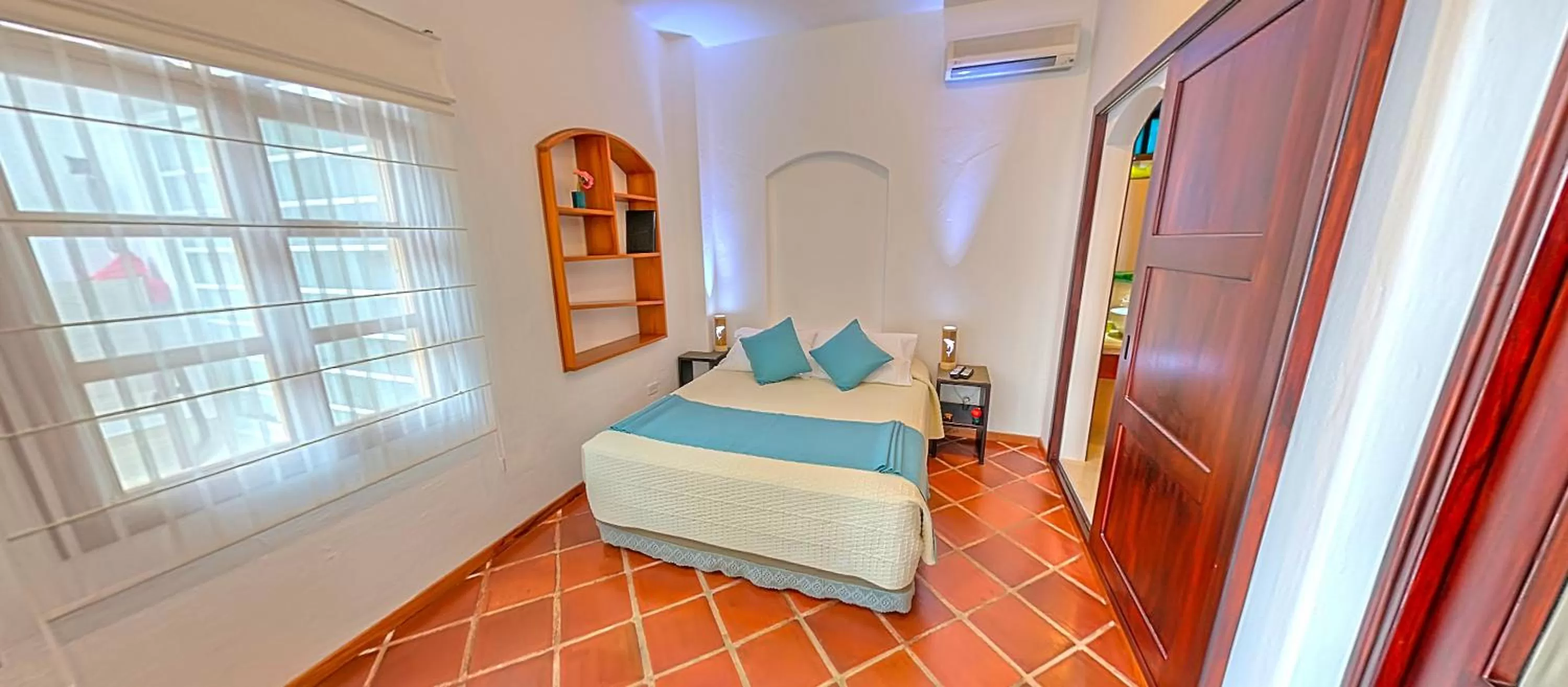 Bedroom, Seating Area in Hotel Galapagos Suites B&B
