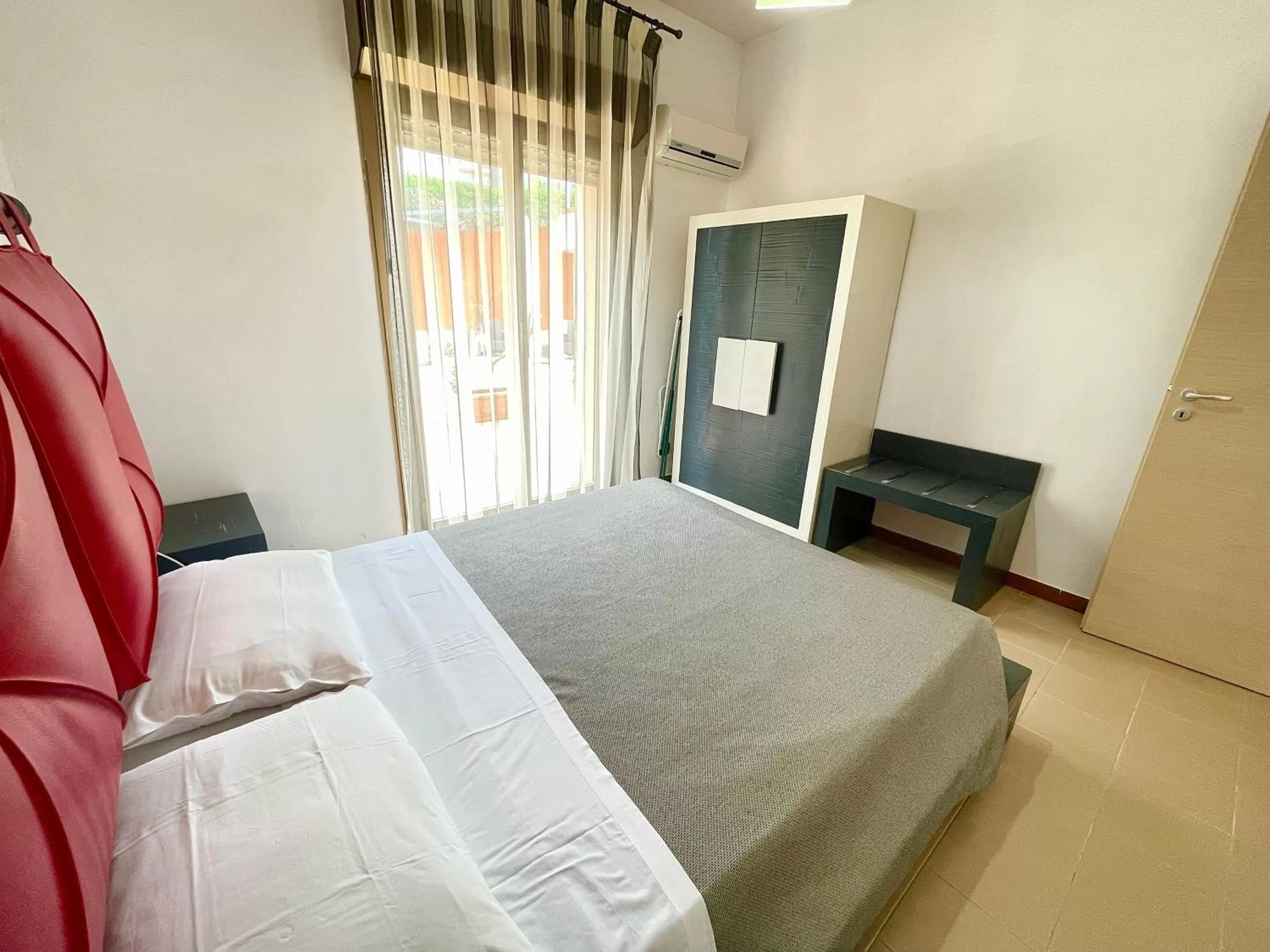 Bed in Aparthotel Isabella