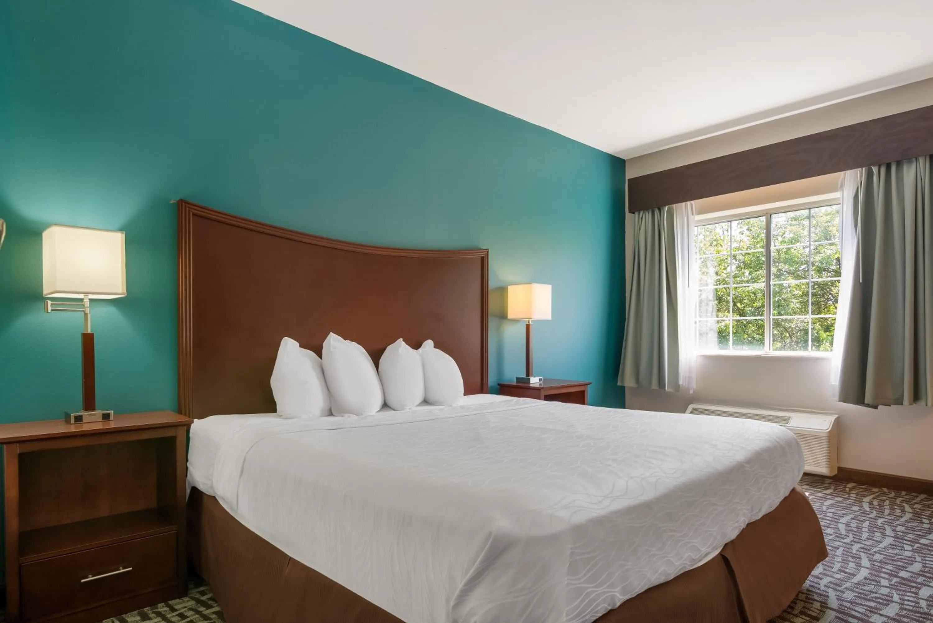 Bed in SureStay Plus Hotel by Best Western Topeka