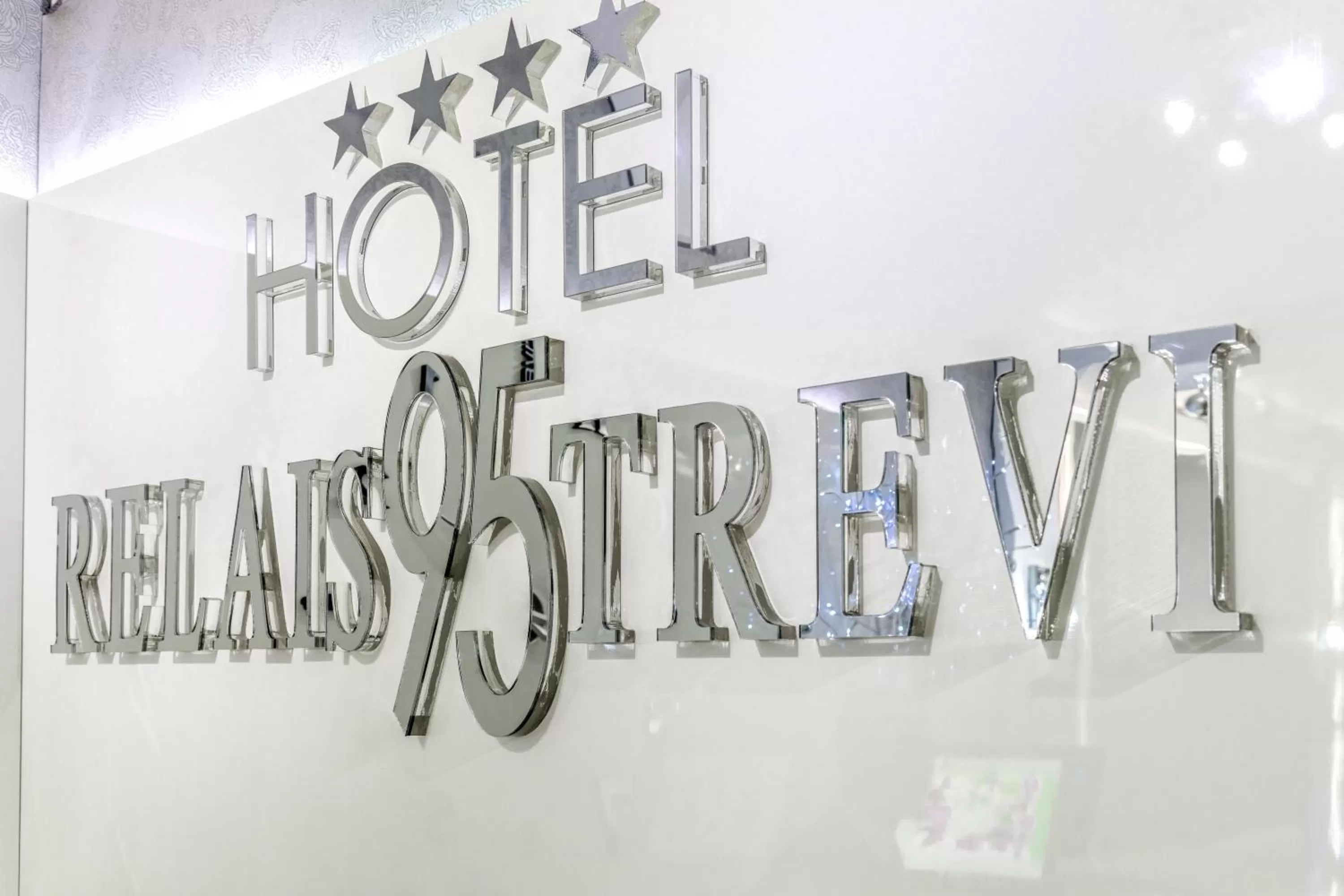 Property logo or sign in Relais Trevi 95 Boutique Hotel