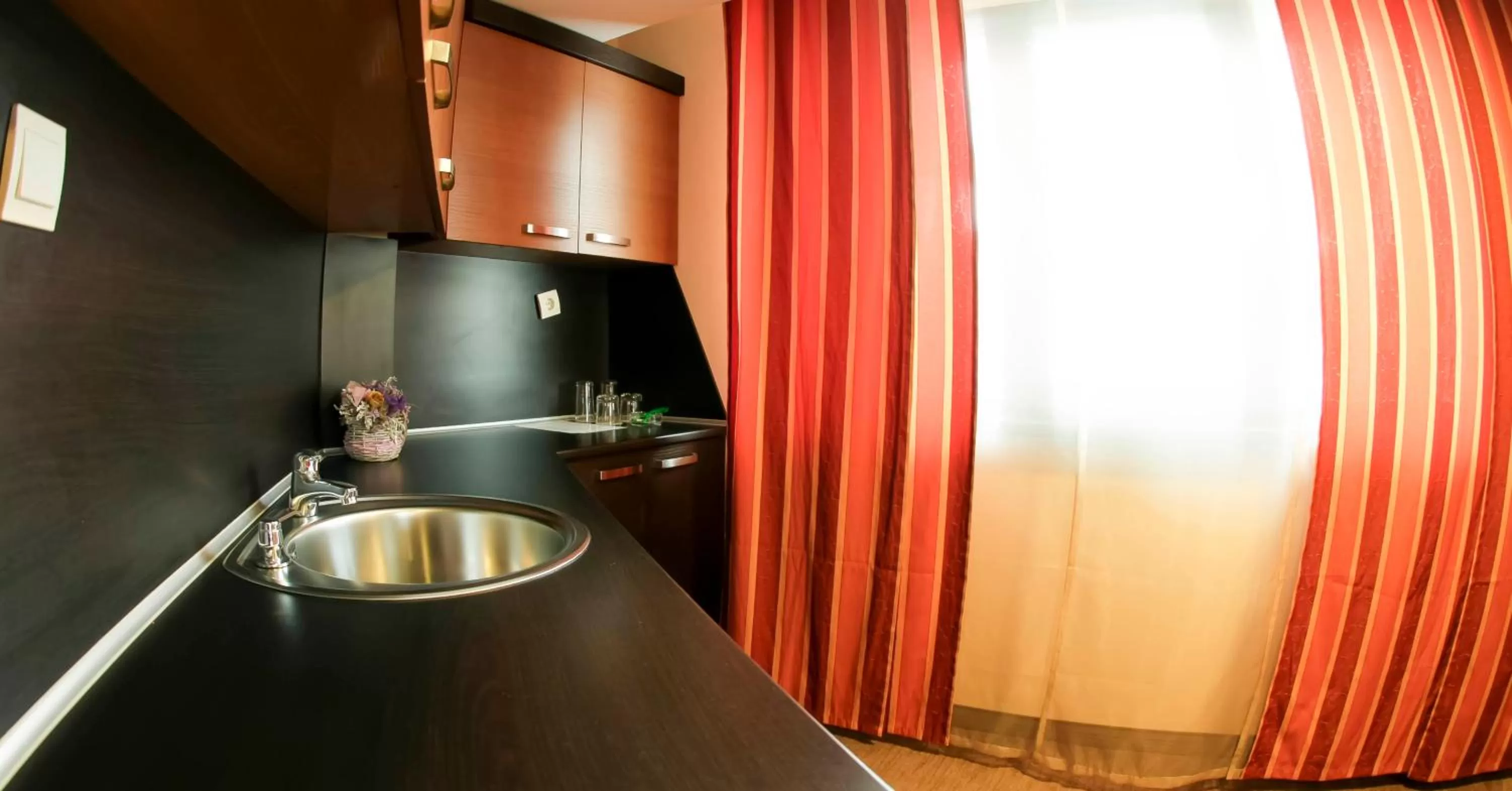 Kitchen/Kitchenette in Edi Hotel