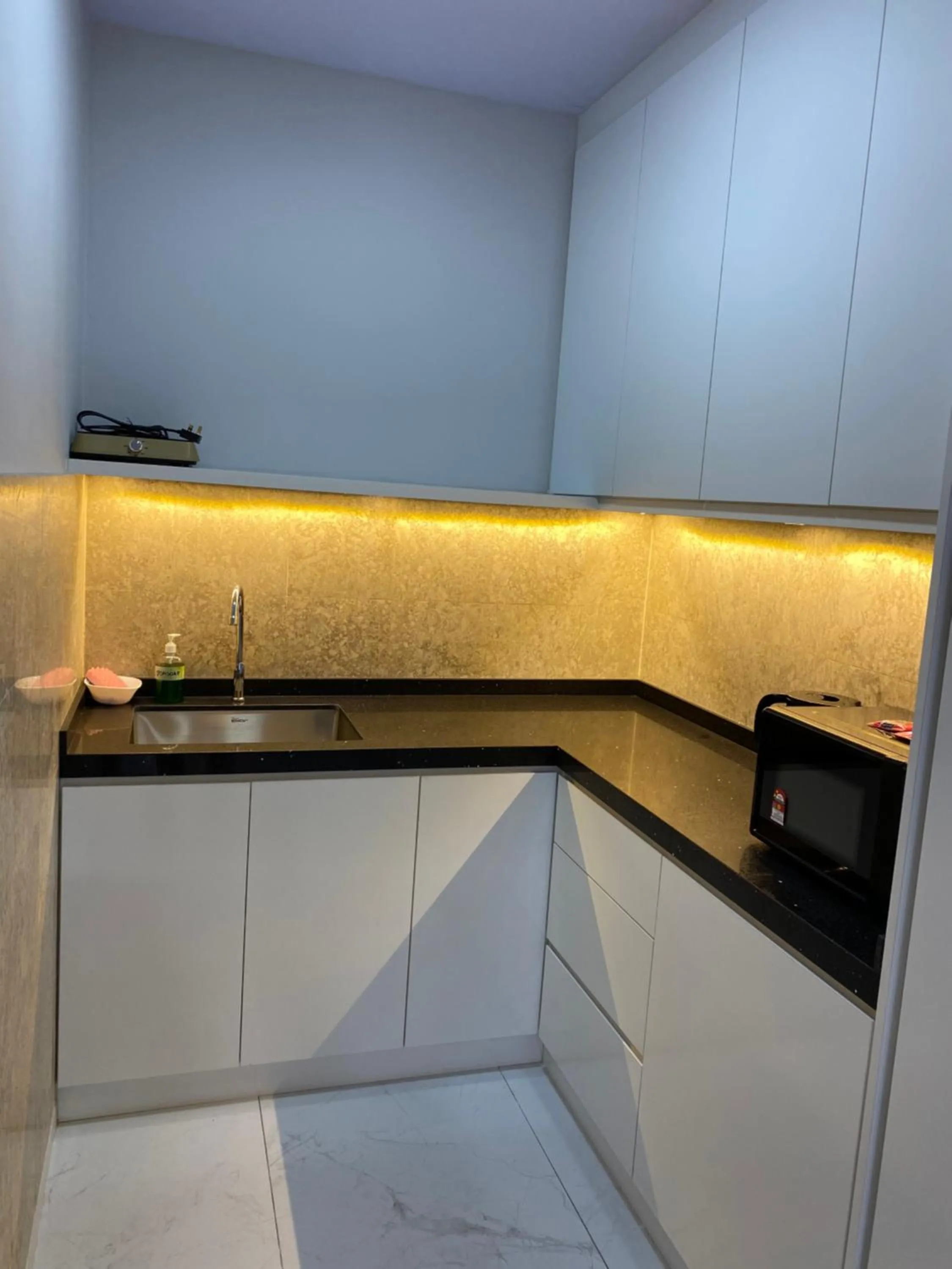 Kitchen or kitchenette in Serviced Apartments at Times Square Kuala Lumpur by Robinsons