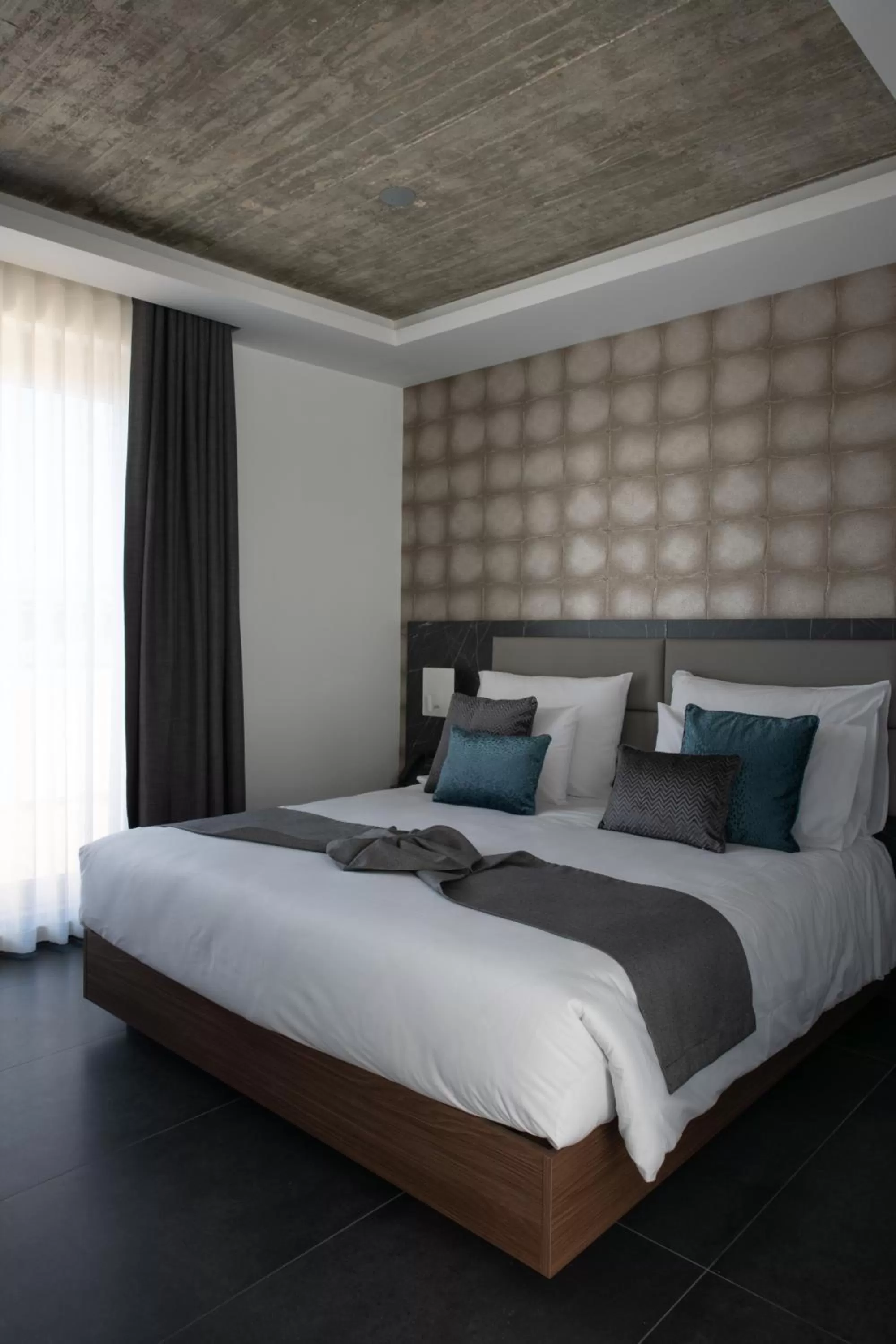 Bed in Marea Boutique Hotels