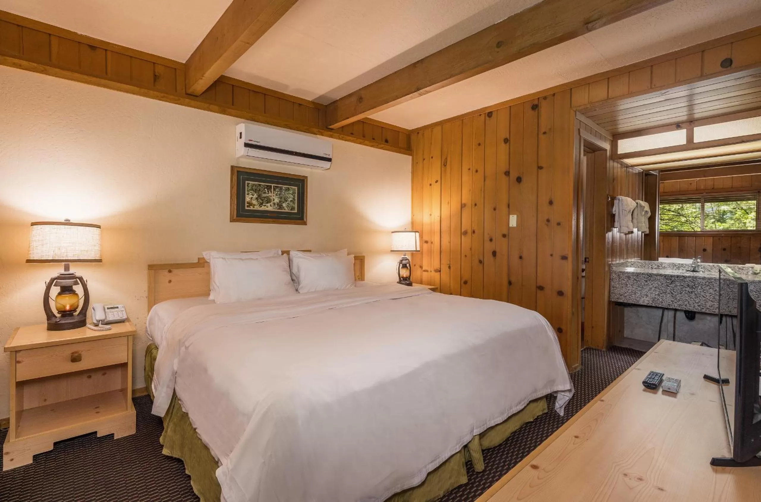 Bed in The Pines Resort & Conference Center