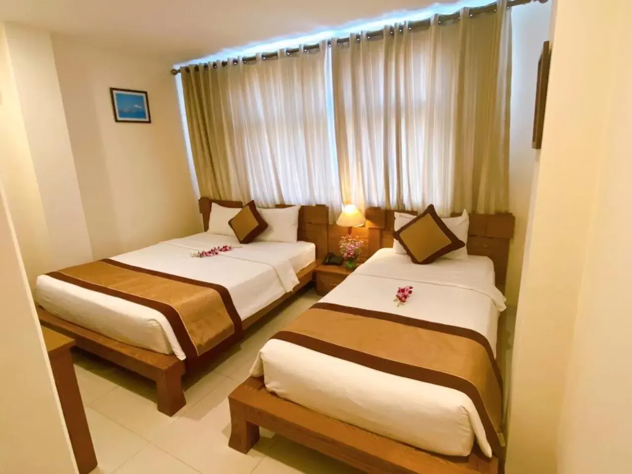 Triple Room with City View in Ipeace Hotel - Bùi Viện Walking Street Triple Room with City View in Ipeace Hotel - Bùi Viện Walking Street