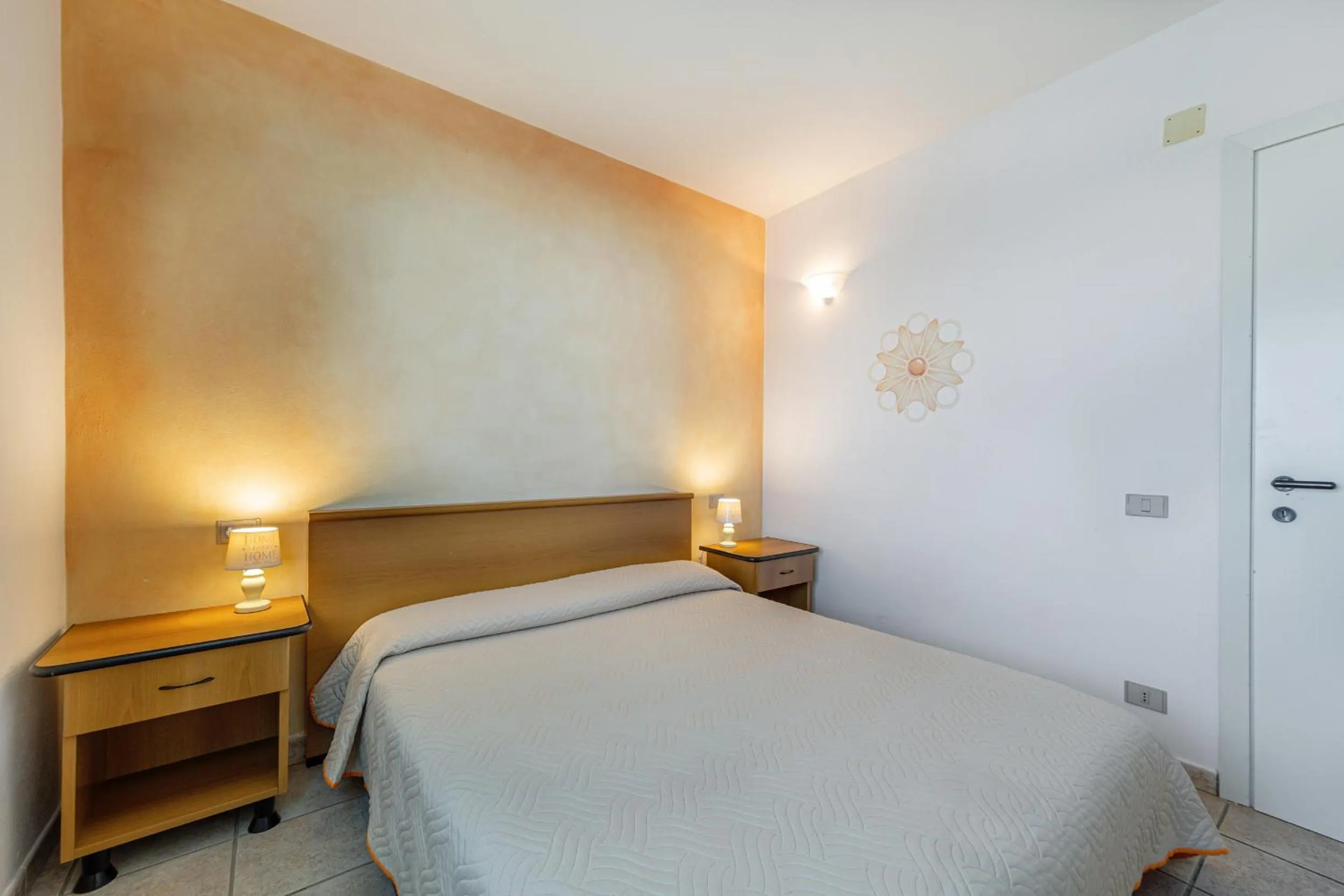 Bed in Marina Manna Hotel and Club Village