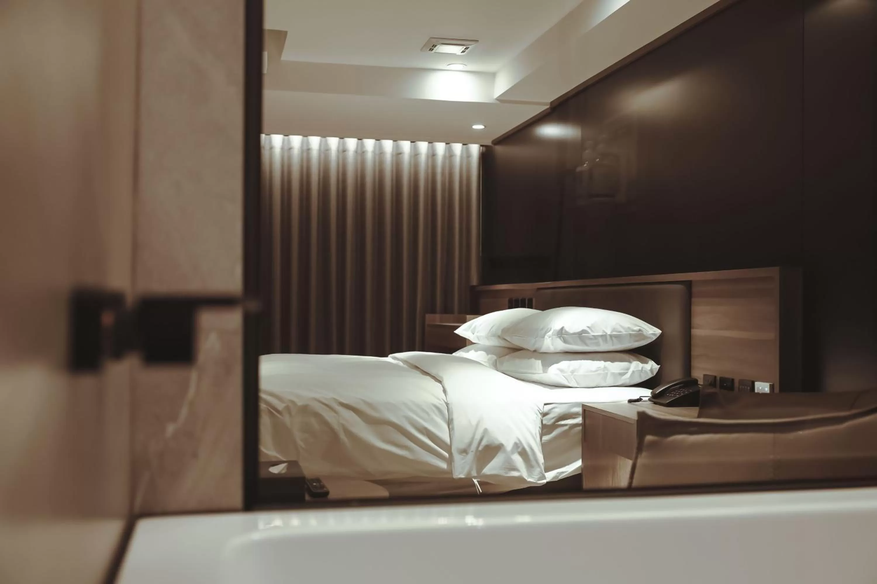 Bed in Autumn Willow Hotel