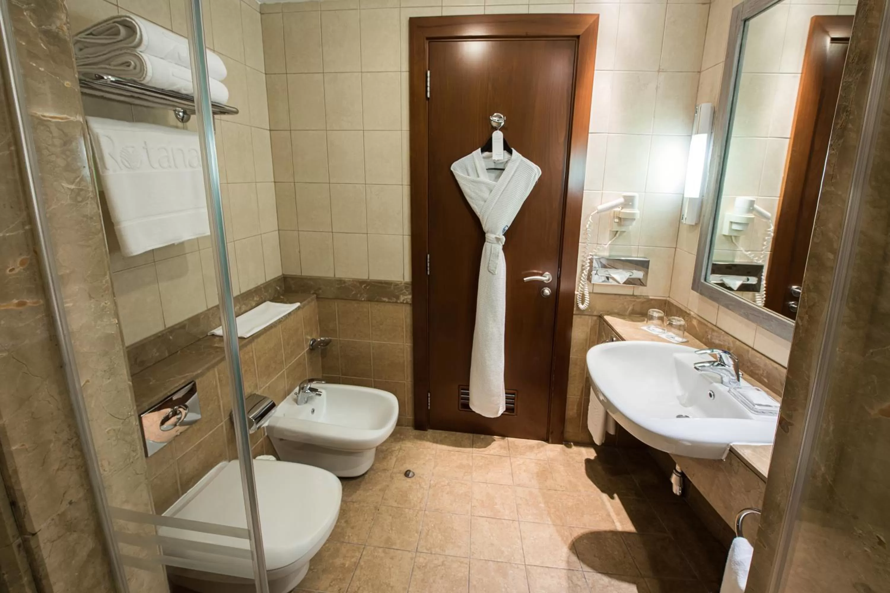 Toilet in Al Rawda Arjaan by Rotana, Abu Dhabi
