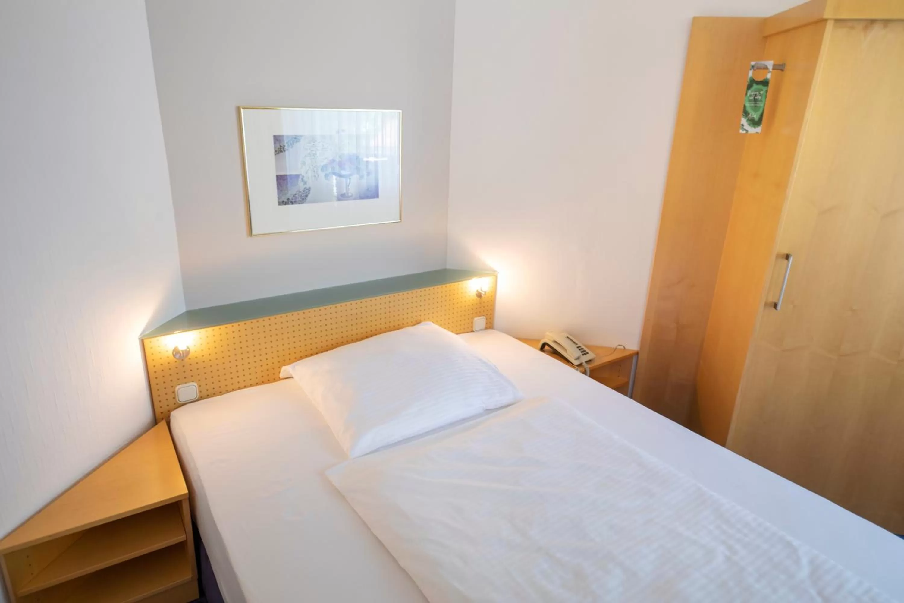 Photo of the whole room, Bed in ACHAT Hotel Suhl