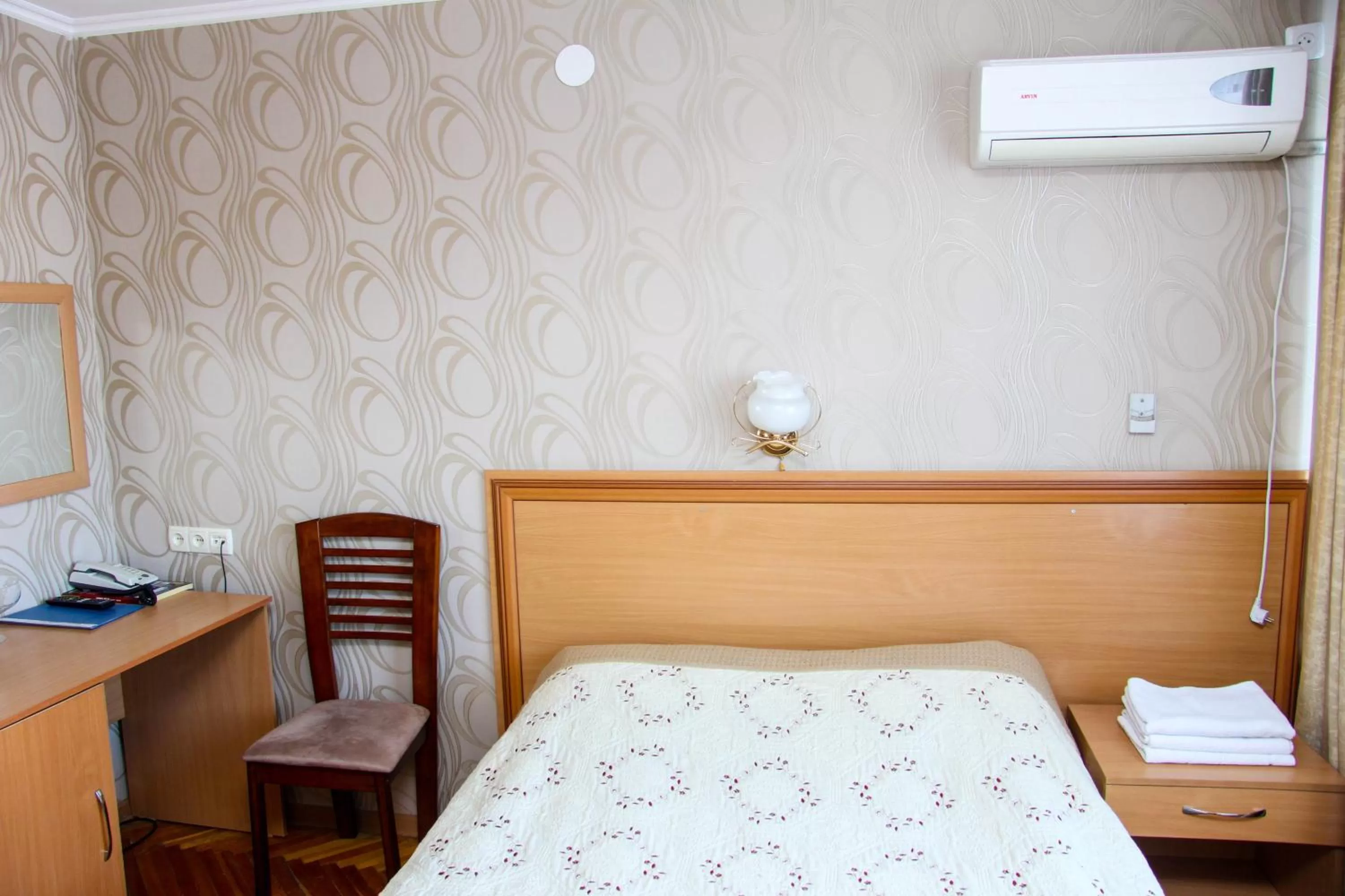 Bed in Ust-Kamenogorsk Hotel