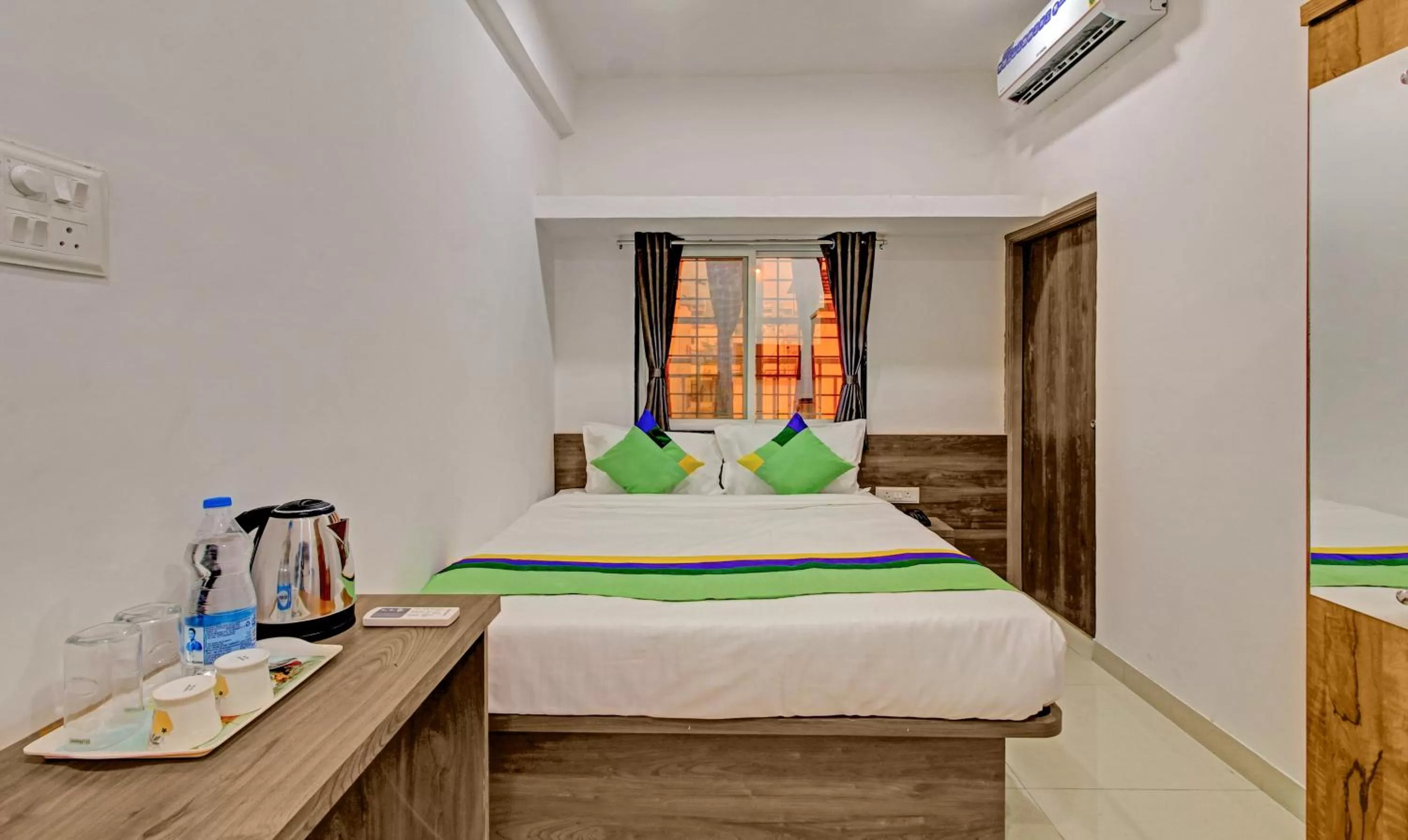 Bed in Treebo Trend White House