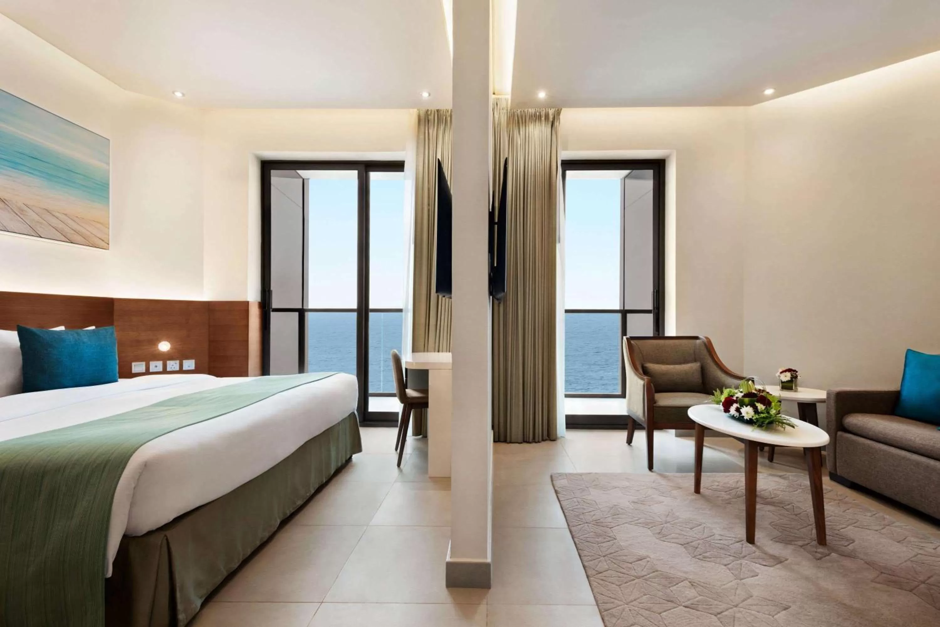 Photo of the whole room, Bed in Wyndham Garden Ajman Corniche