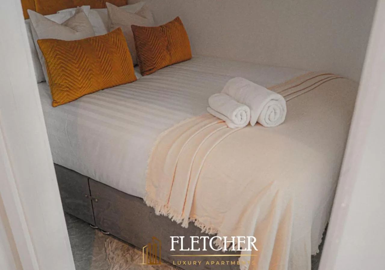 Bed in Spire Accommodations Ltd