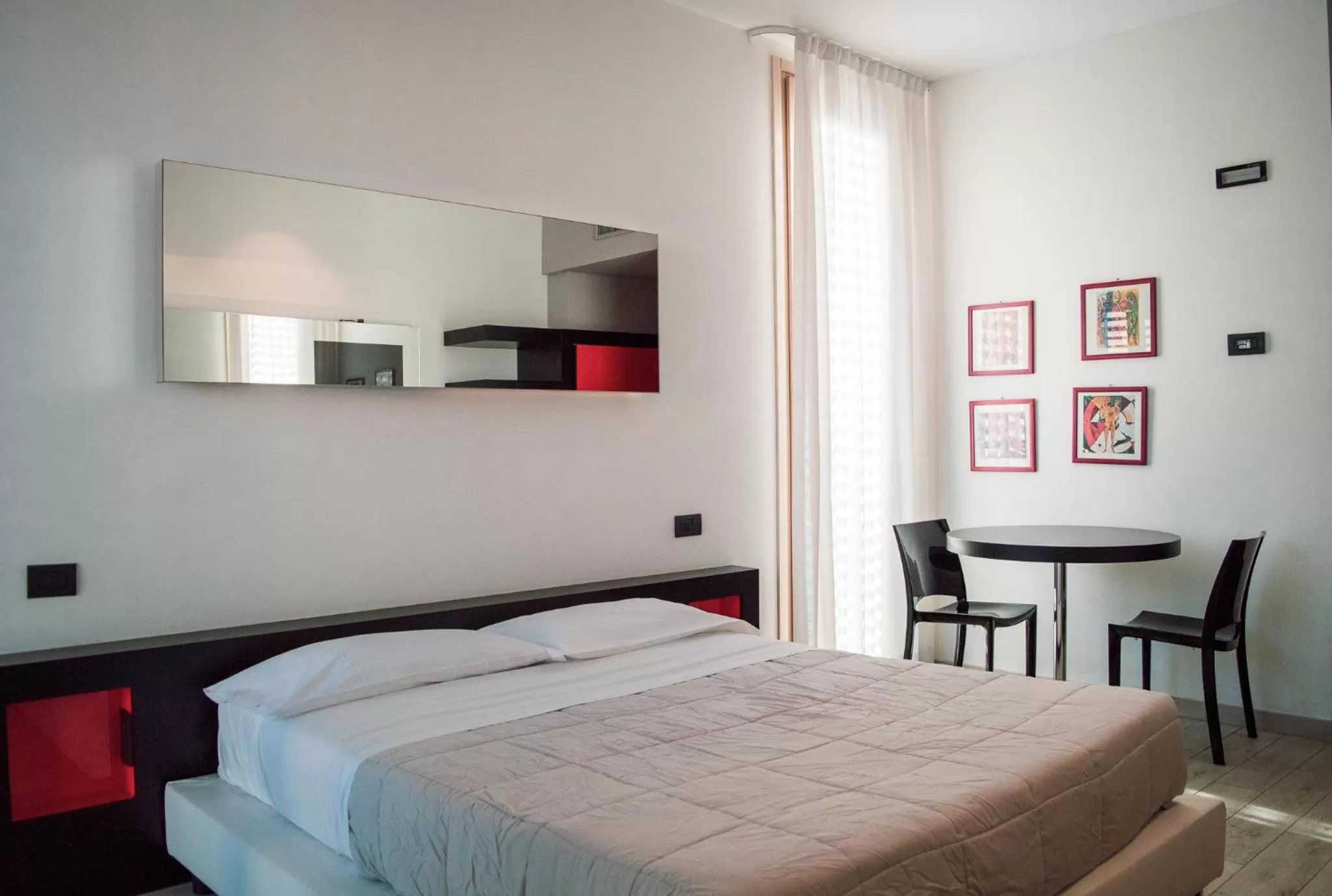 Bed in Blue Shades Hotel