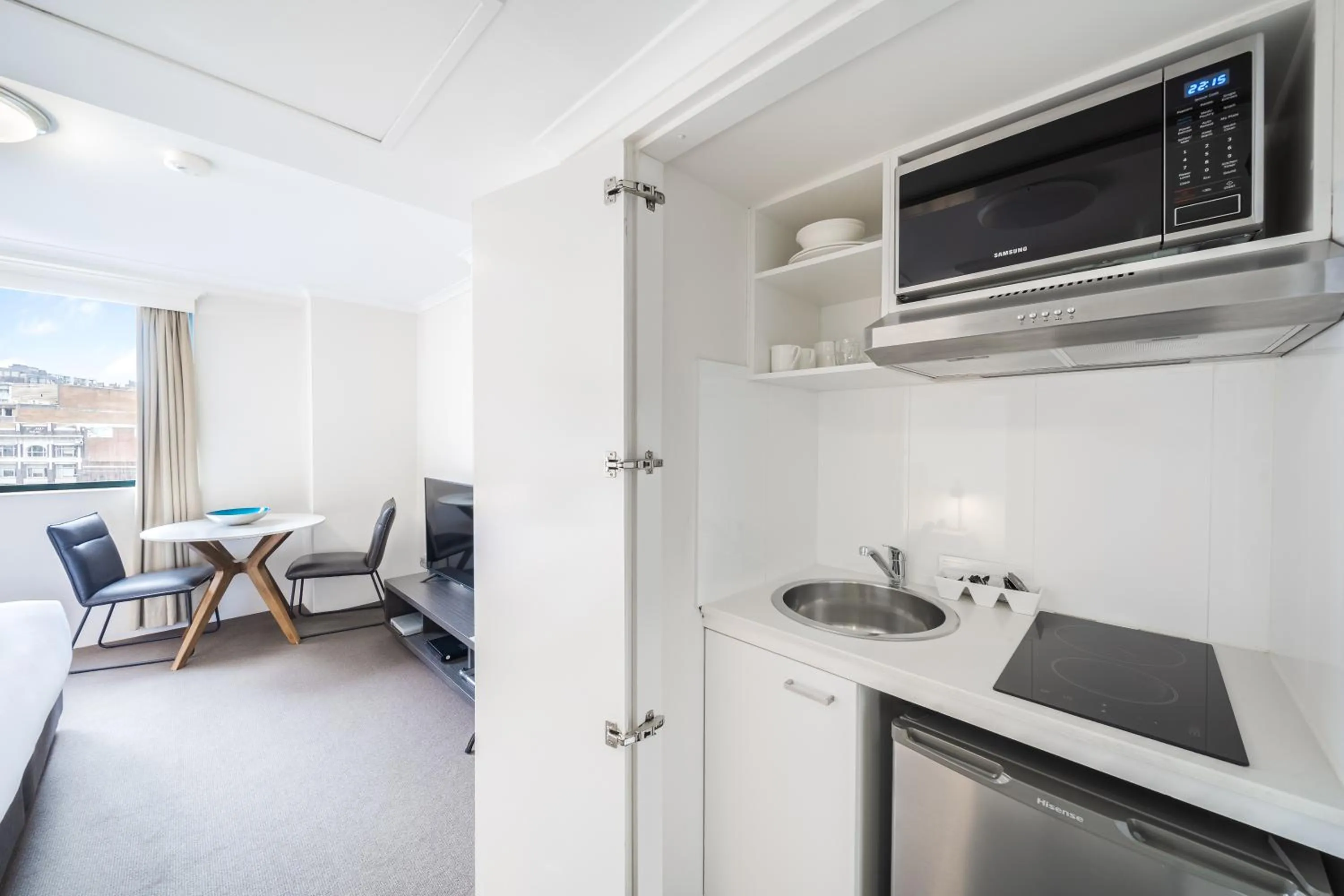 Kitchen or kitchenette in Oaks Sydney Castlereagh Suites