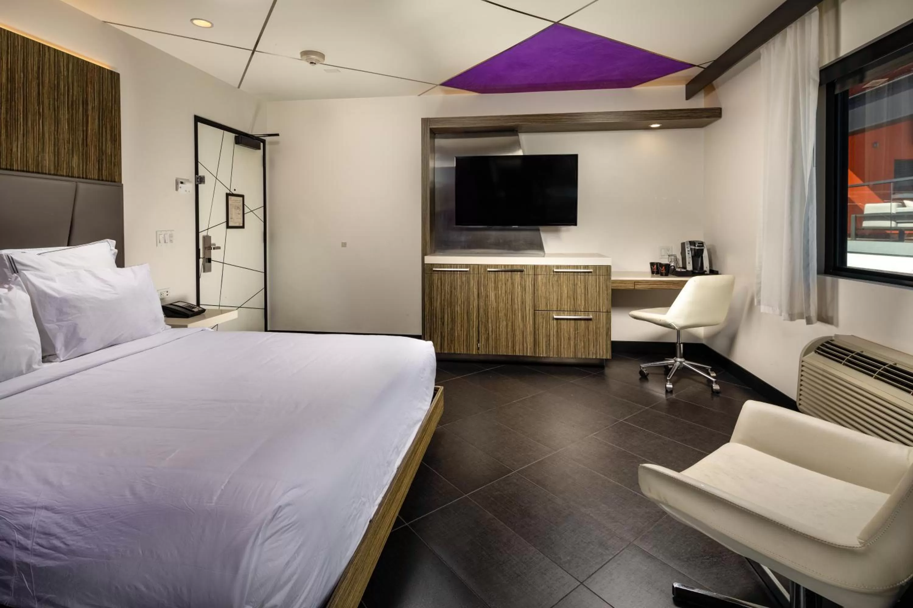 Photo of the whole room, Bed in The Moment Hotel