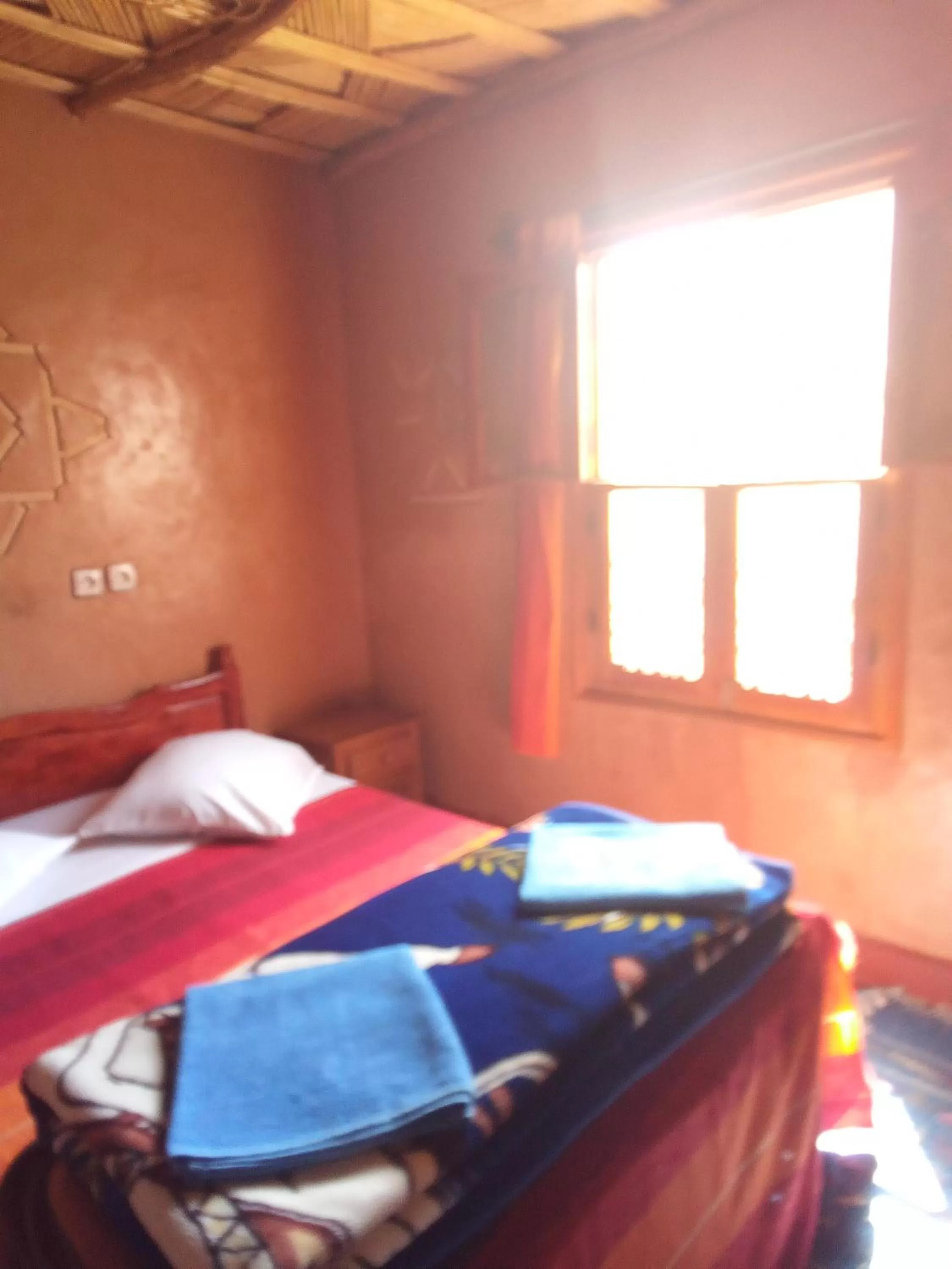 Bed in Maison d'Hôte Valentine