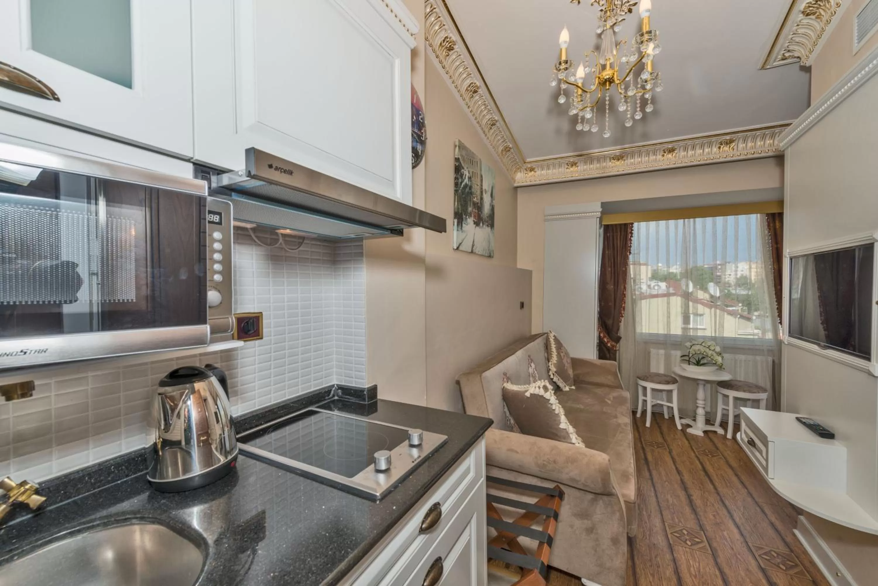 Kitchen or kitchenette in IQ Hotel