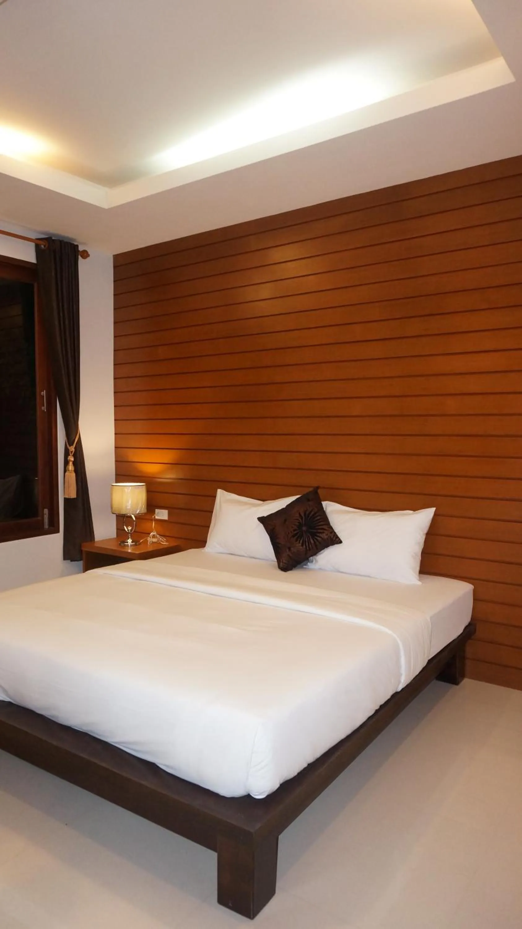 Bed in Lanta Intanin Resort - SHA Extra Plus