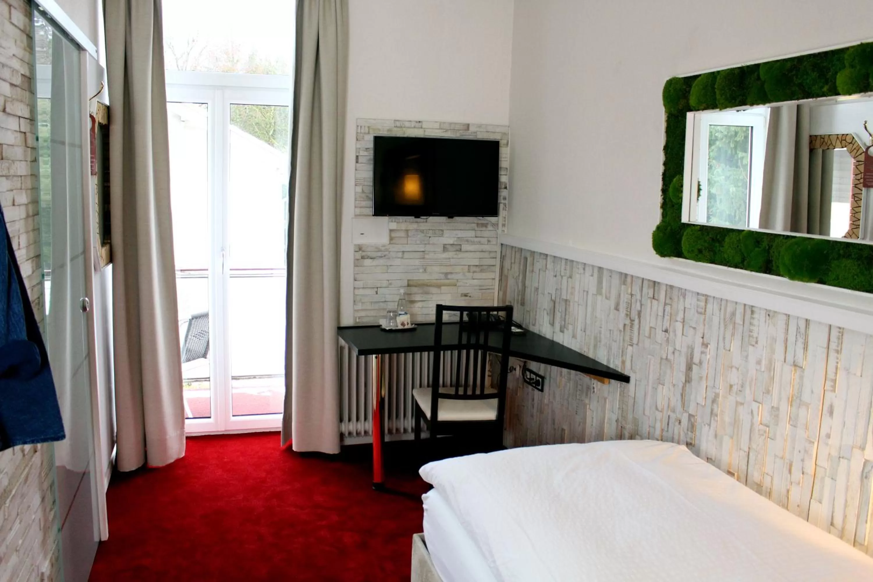 Photo of the whole room, TV/Entertainment Center in Hotel Almrausch