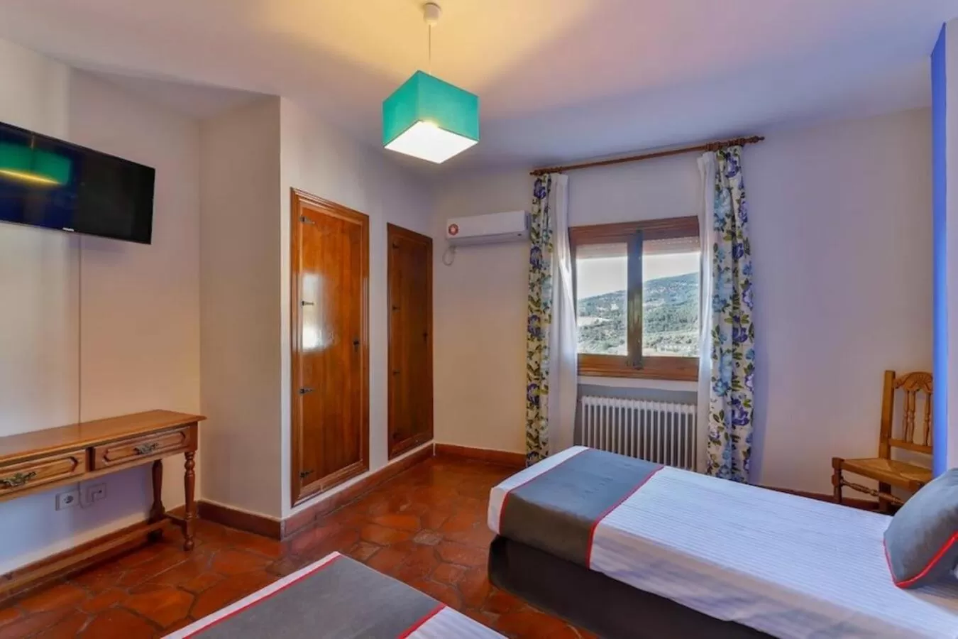 Bed in Hostal Alfonso XI