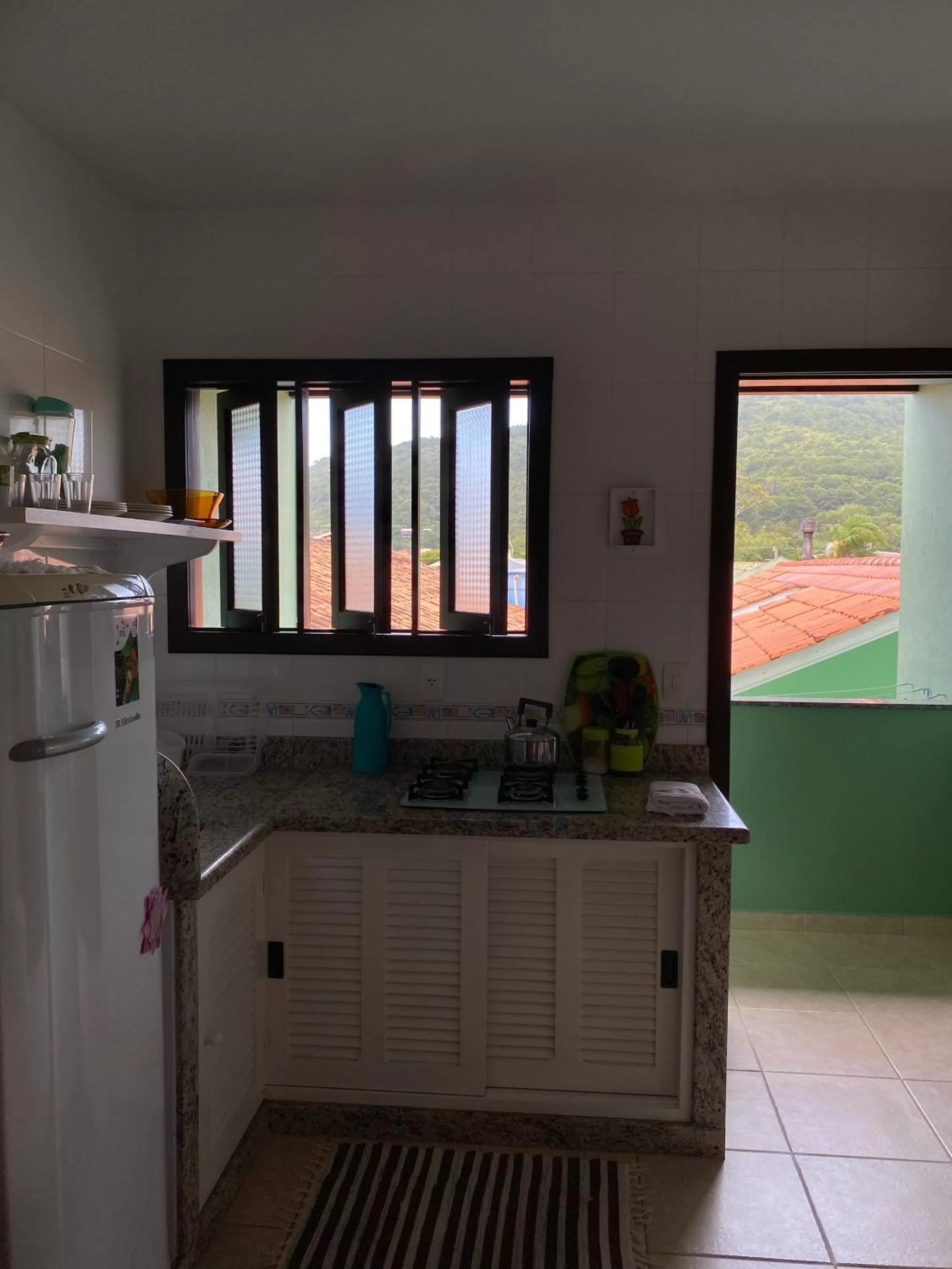 Kitchen/Kitchenette in Canto Leste Pousada