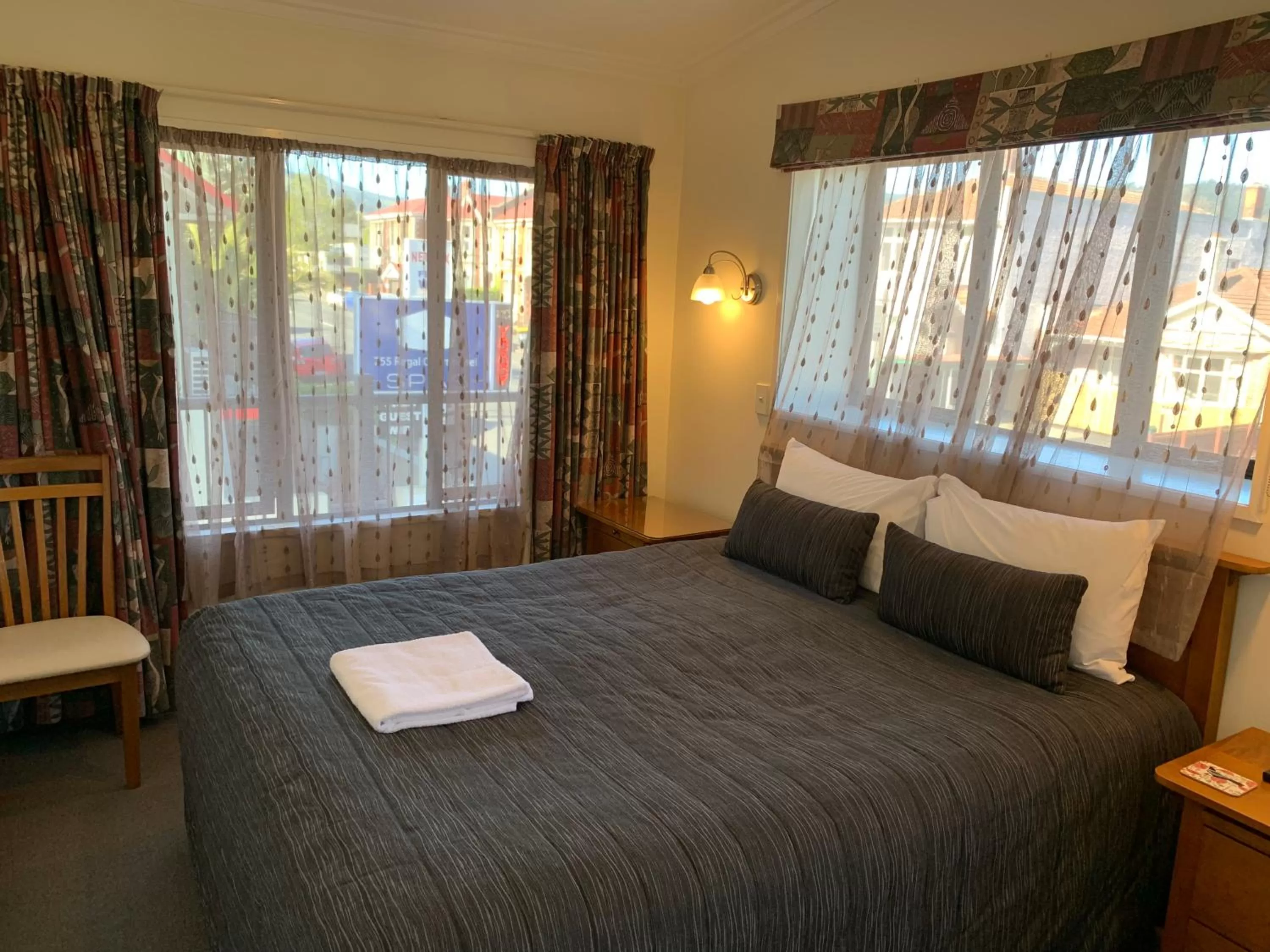 Bed in 755 Regal Court Motel