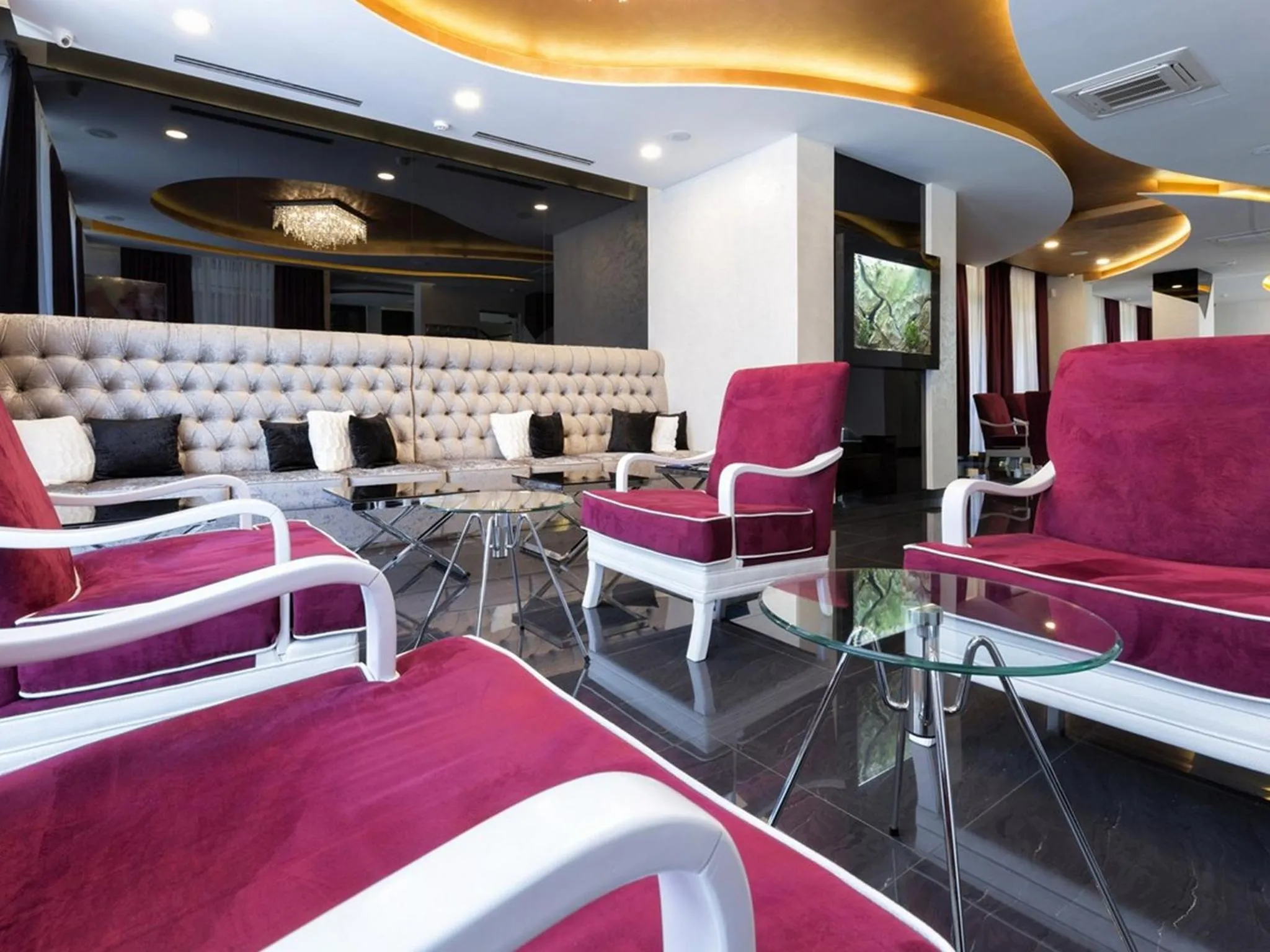 Communal lounge/ TV room in Nova City Garni Hotel Signature Collection