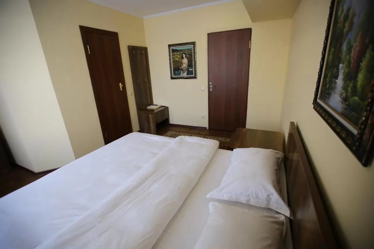 Bed in Altai Business Hotel