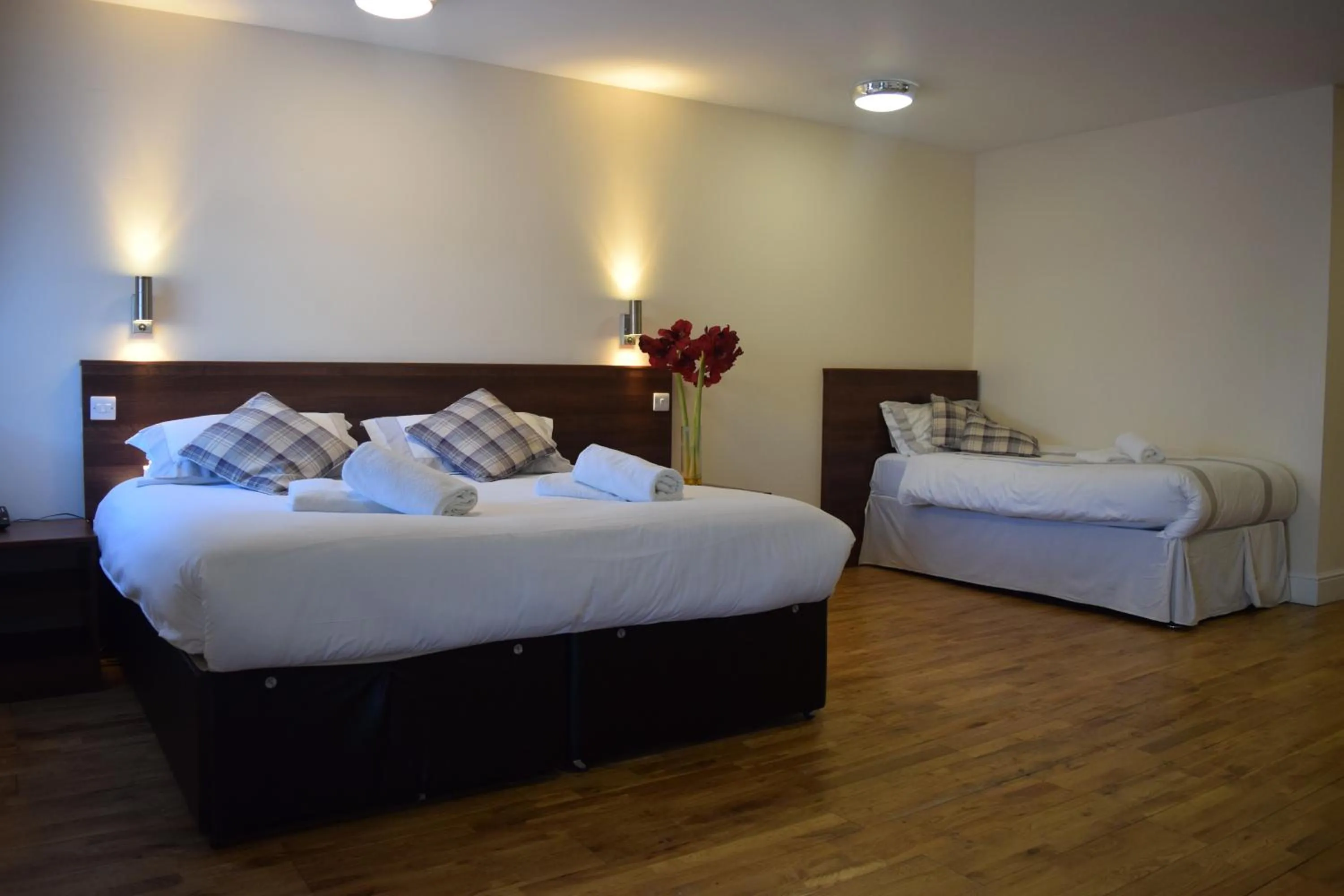 Bed in Star Anglia Hotel City Center by OYO