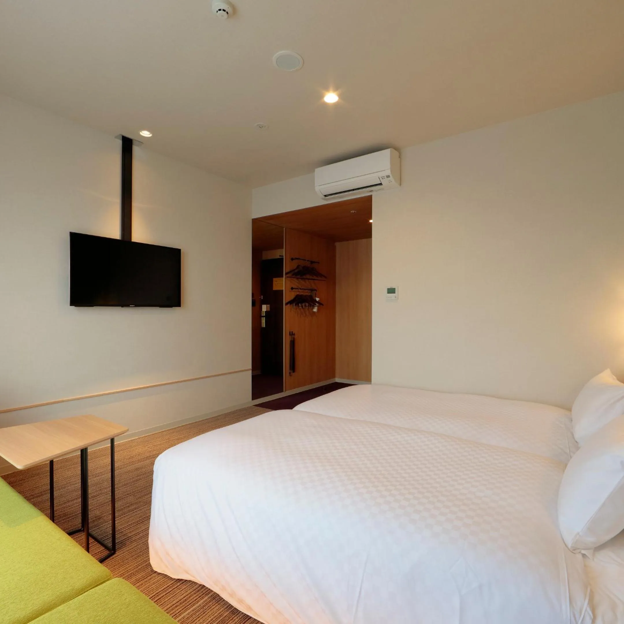 Bed in Candeo Hotels Osaka Kishibe