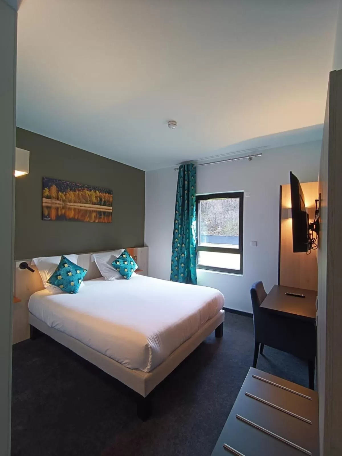 Bed in Hôtel Restaurant AKENA Molinges - La Brocatelle