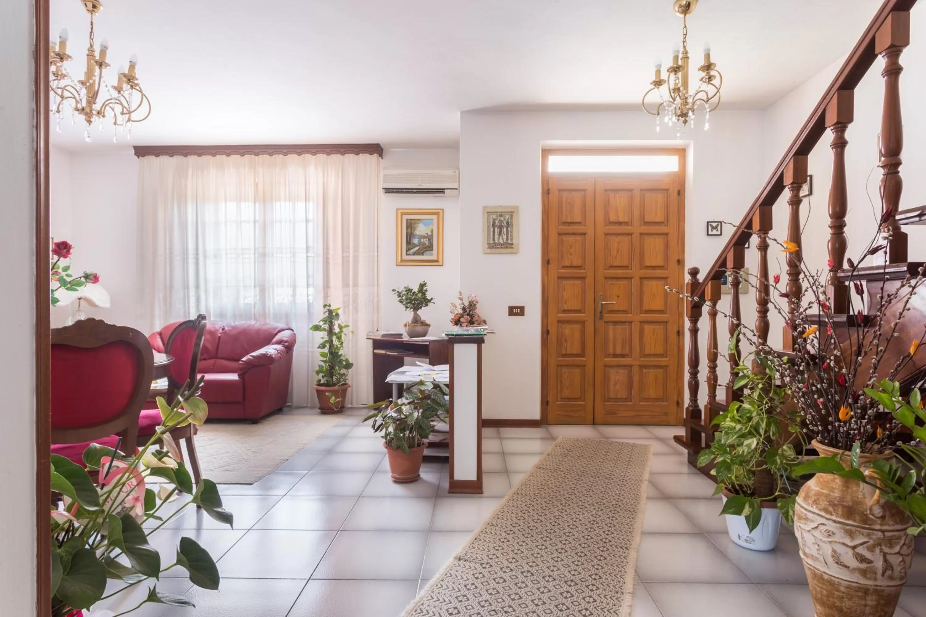 Communal lounge/ TV room in B&B Il Mirto