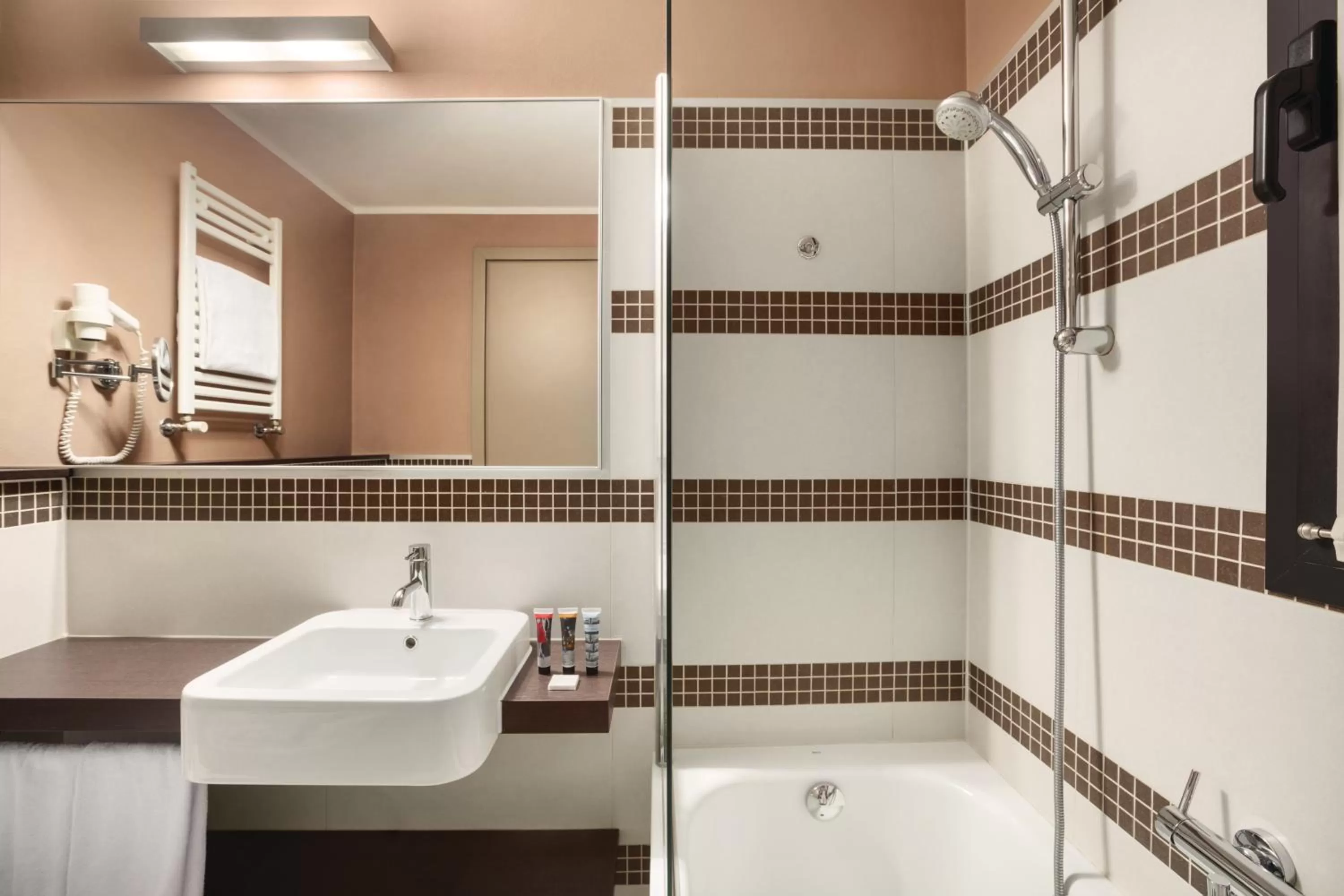 Bathroom in Ramada Plaza by Wyndham Milano